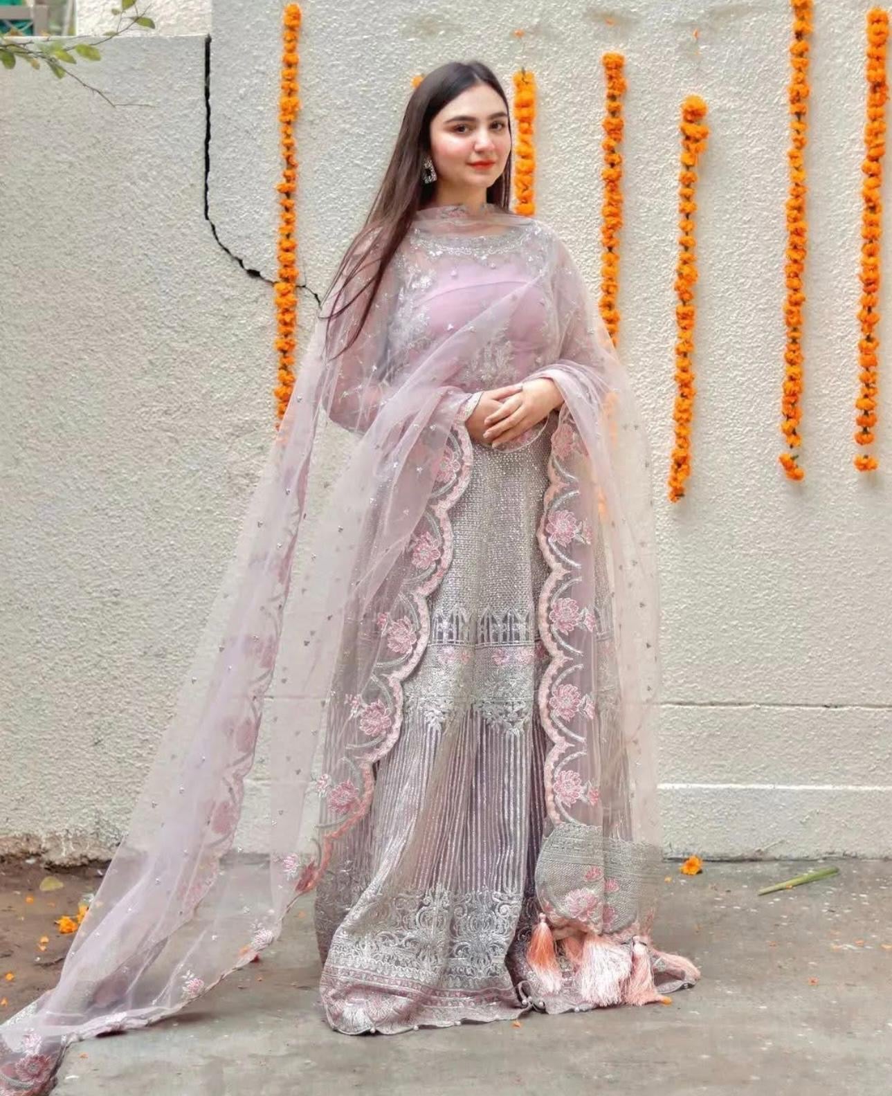 • Clothing: Embroidered/Printed suit for women - Made of best quality fabric - lawn or linen or chiffon - pure silk - Available at Najma Designs & Co. • Jewelry: Gold - plated stud earrings for