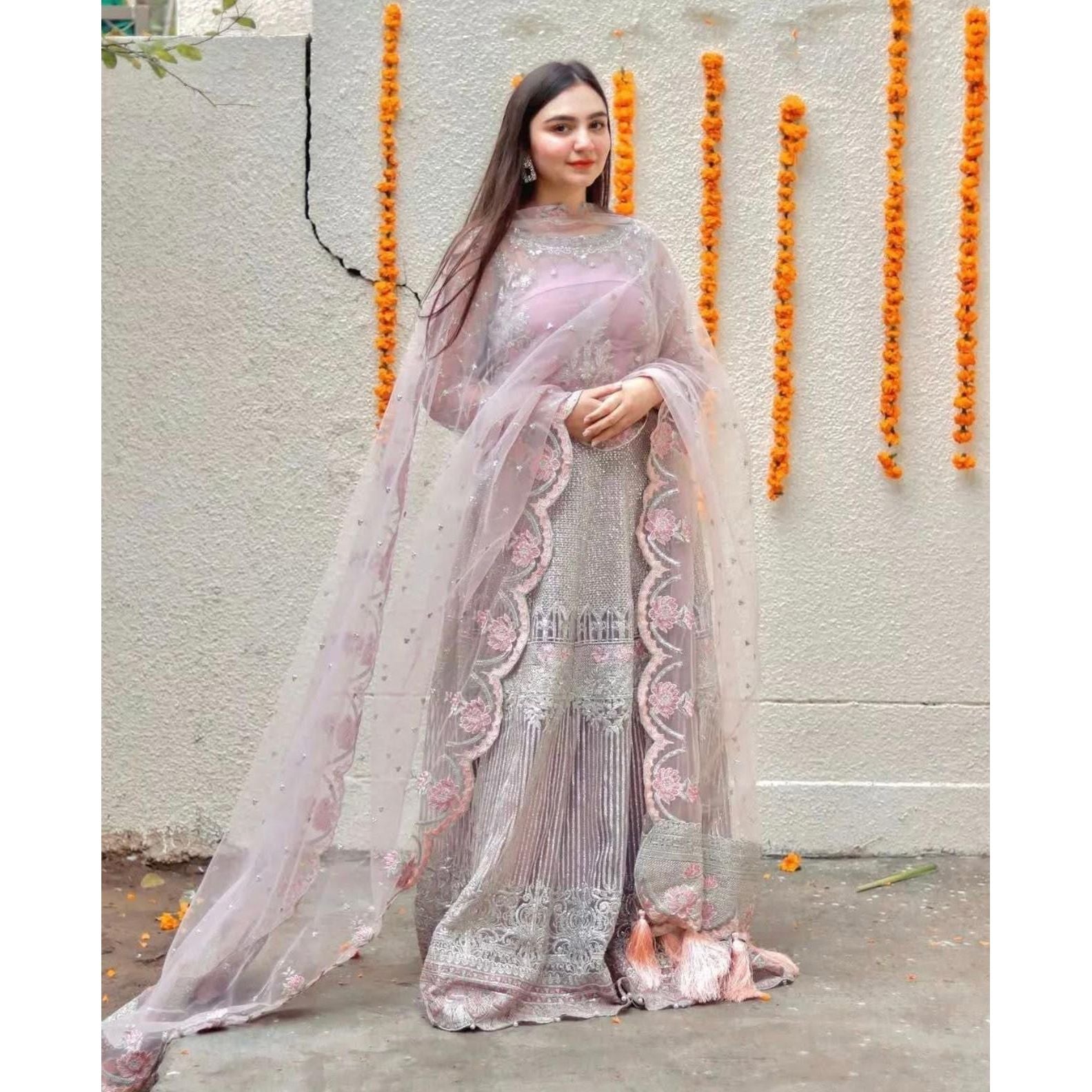 • Clothing: Embroidered/Printed suit for women - Made of best quality fabric - lawn or linen or chiffon - pure silk - Available at Najma Designs & Co. • Jewelry: Gold - plated stud earrings for