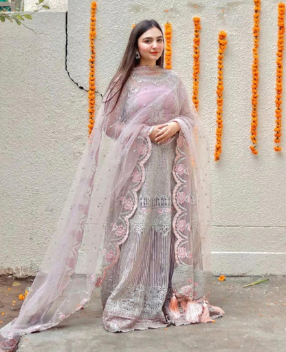 • Clothing: Embroidered/Printed suit for women - Made of best quality fabric - lawn or linen or chiffon - pure silk - Available at Najma Designs & Co. • Jewelry: Gold - plated stud earrings for
