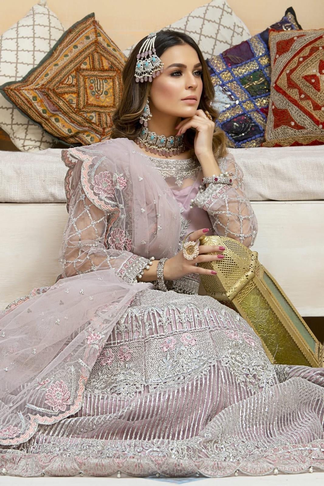 • Clothing: Embroidered/Printed suit for women - Made of best quality fabric - lawn or linen or chiffon - pure silk - Available at Najma Designs & Co. • Jewelry: Gold - plated stud earrings for