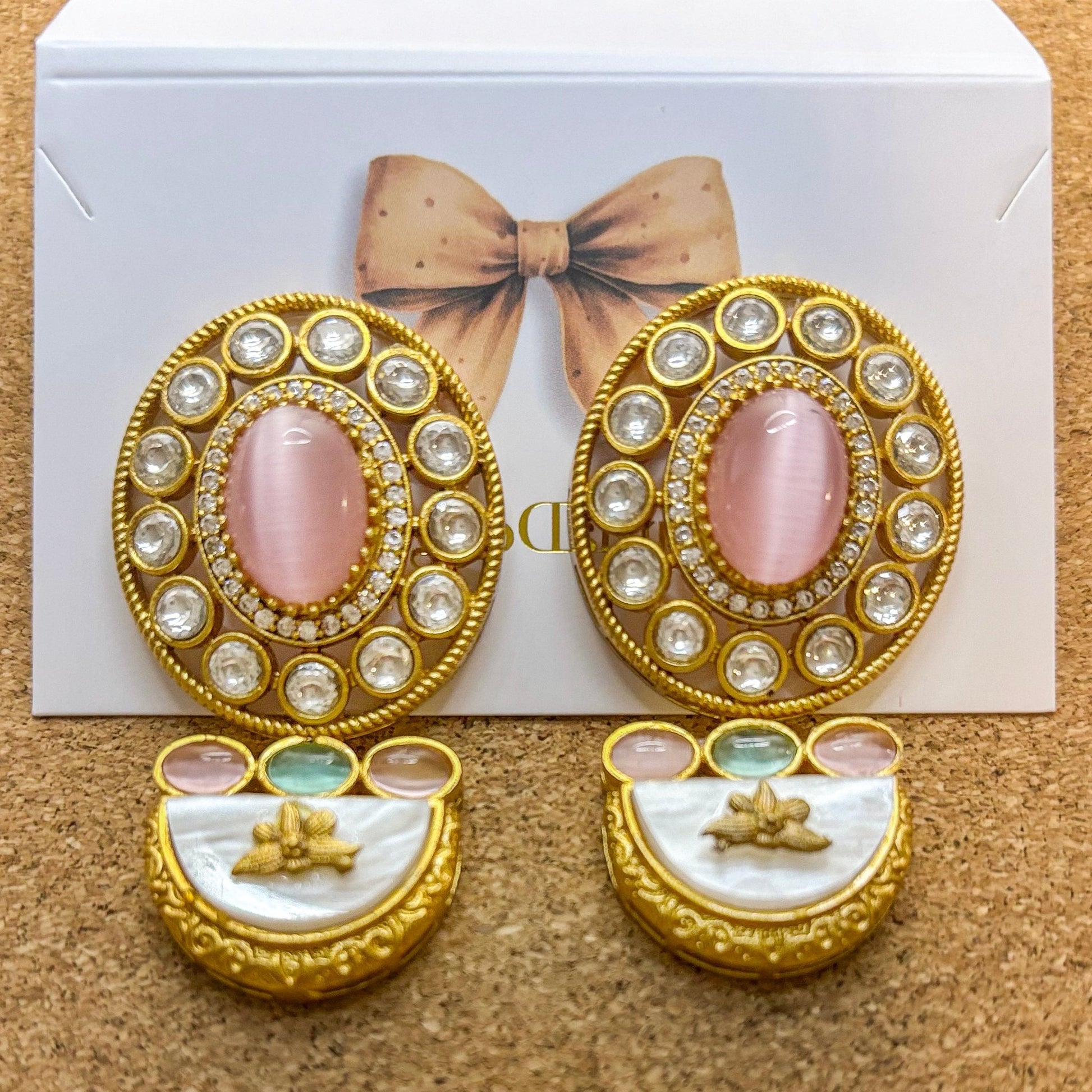 • Clothing: Embroidered/Printed suit for women - Made of best quality fabric - lawn or linen or chiffon - pure silk - Available at Najma Designs & Co. • Jewelry: Gold - plated stud earrings for