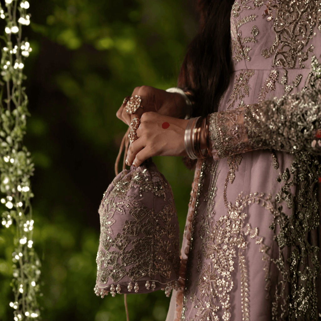 • Clothing: Embroidered/Printed suit for women - Made of best quality fabric - lawn or linen or chiffon - pure silk - Available at Najma Designs & Co. • Jewelry: Gold - plated stud earrings for