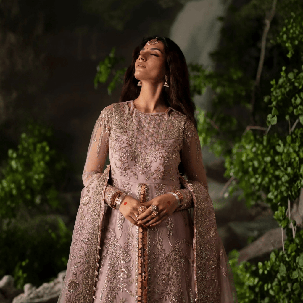 • Clothing: Embroidered/Printed suit for women - Made of best quality fabric - lawn or linen or chiffon - pure silk - Available at Najma Designs & Co. • Jewelry: Gold - plated stud earrings for