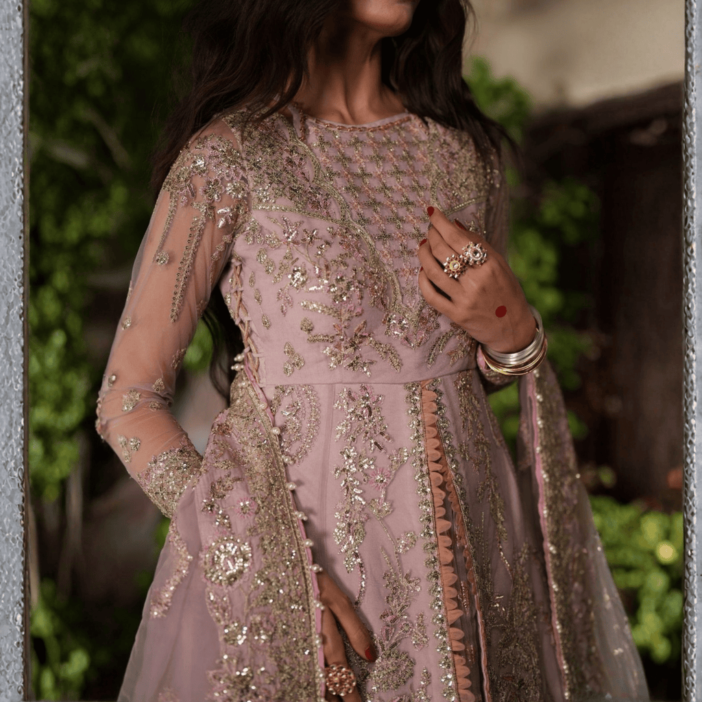 • Clothing: Embroidered/Printed suit for women - Made of best quality fabric - lawn or linen or chiffon - pure silk - Available at Najma Designs & Co. • Jewelry: Gold - plated stud earrings for