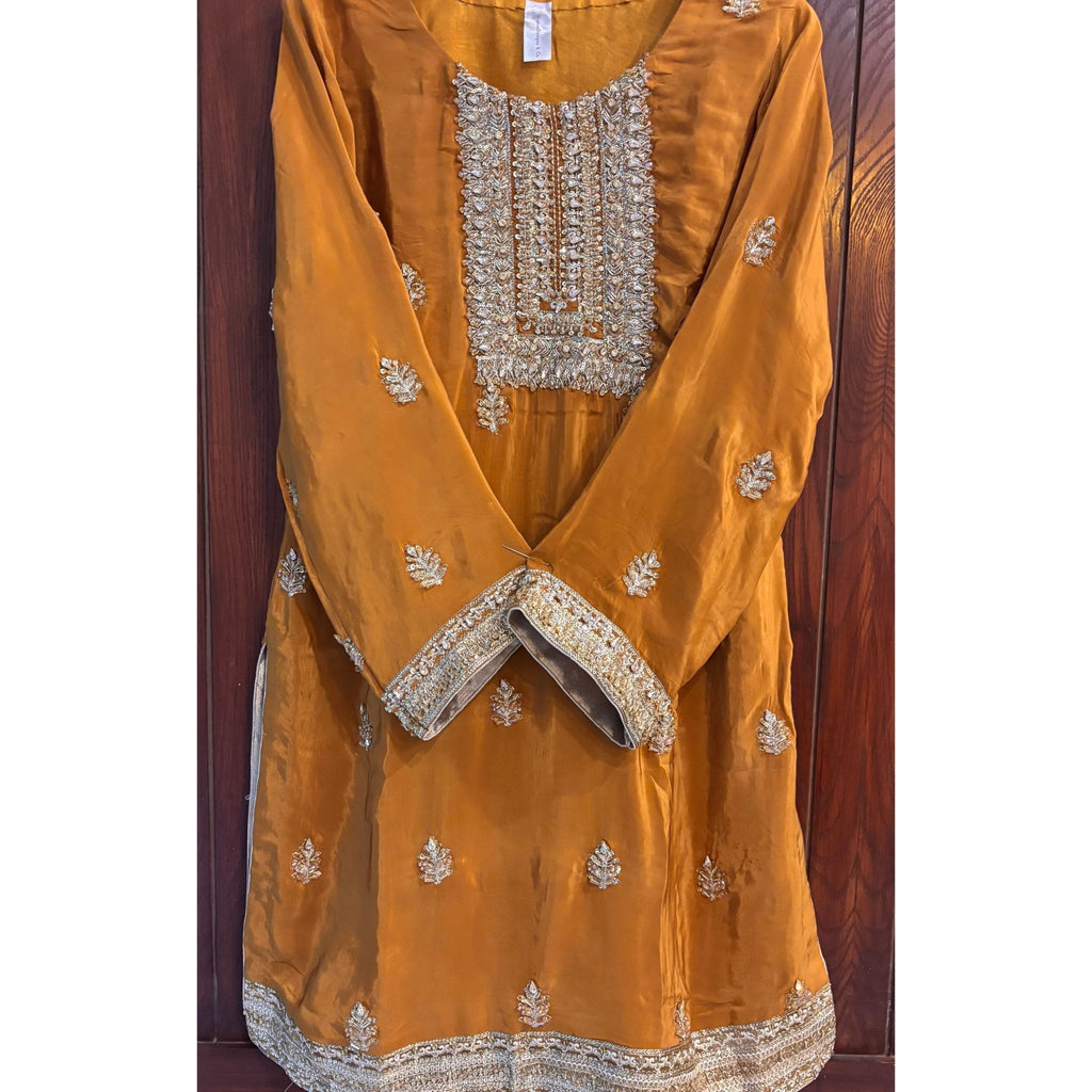 • Clothing: Embroidered/Printed suit for women - Made of best quality fabric - lawn or linen or chiffon - pure silk - Available at Najma Designs & Co. • Jewelry: Gold - plated stud earrings for