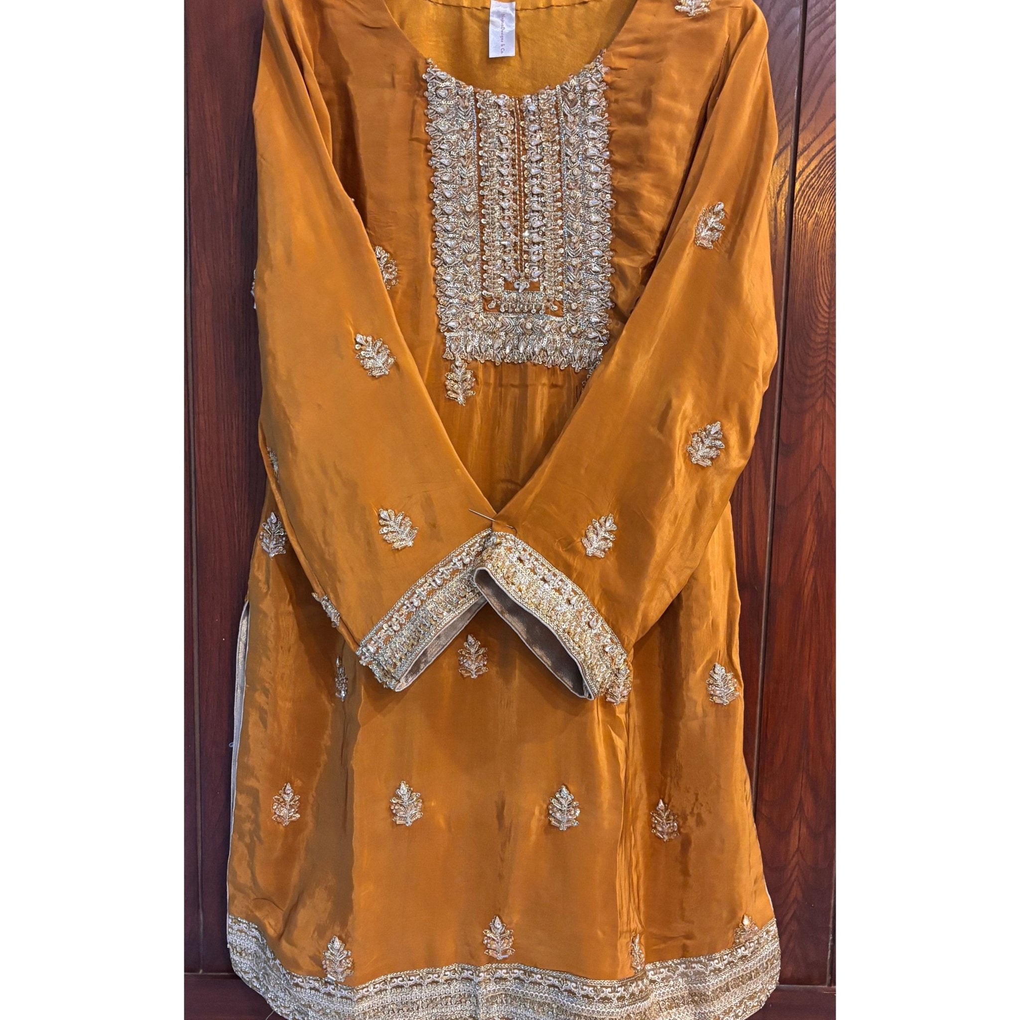 • Clothing: Embroidered/Printed suit for women - Made of best quality fabric - lawn or linen or chiffon - pure silk - Available at Najma Designs & Co. • Jewelry: Gold - plated stud earrings for