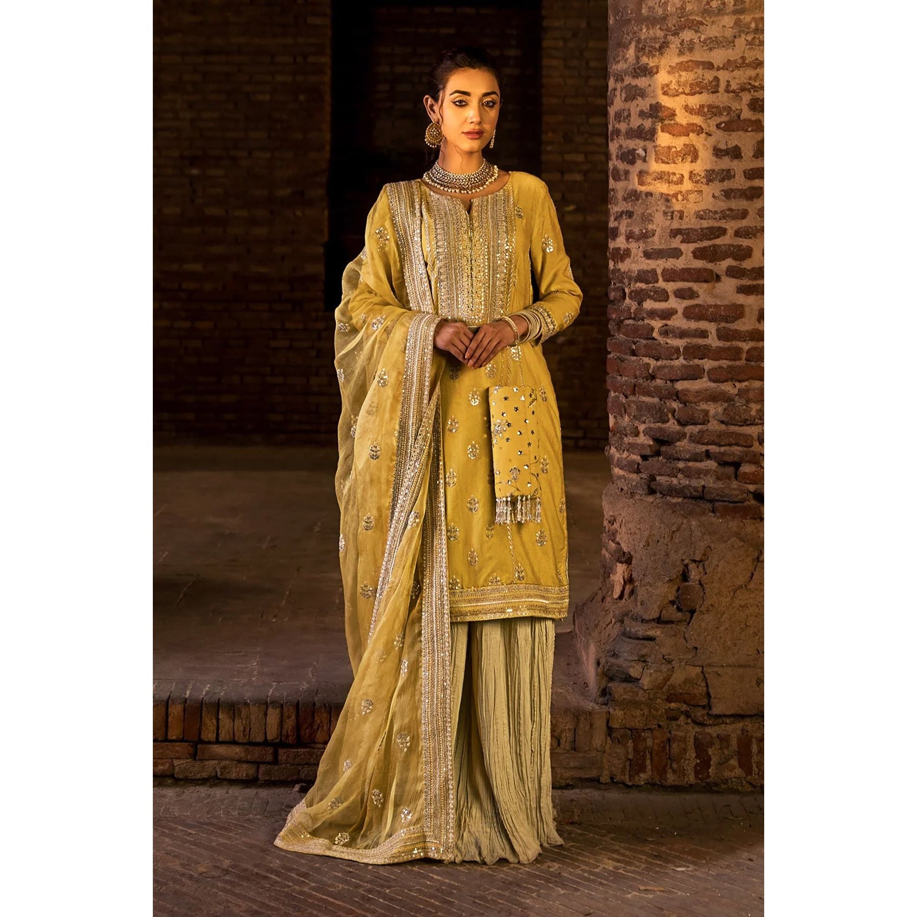• Clothing: Embroidered/Printed suit for women - Made of best quality fabric - lawn or linen or chiffon - pure silk - Available at Najma Designs & Co. • Jewelry: Gold - plated stud earrings for