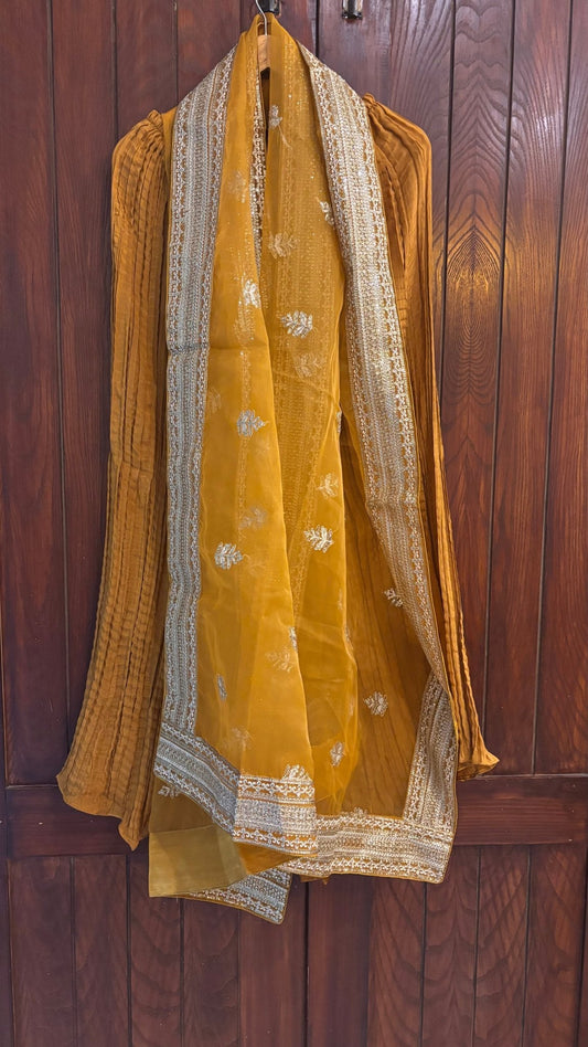 • Clothing: Embroidered/Printed suit for women - Made of best quality fabric - lawn or linen or chiffon - pure silk - Available at Najma Designs & Co. • Jewelry: Gold - plated stud earrings for