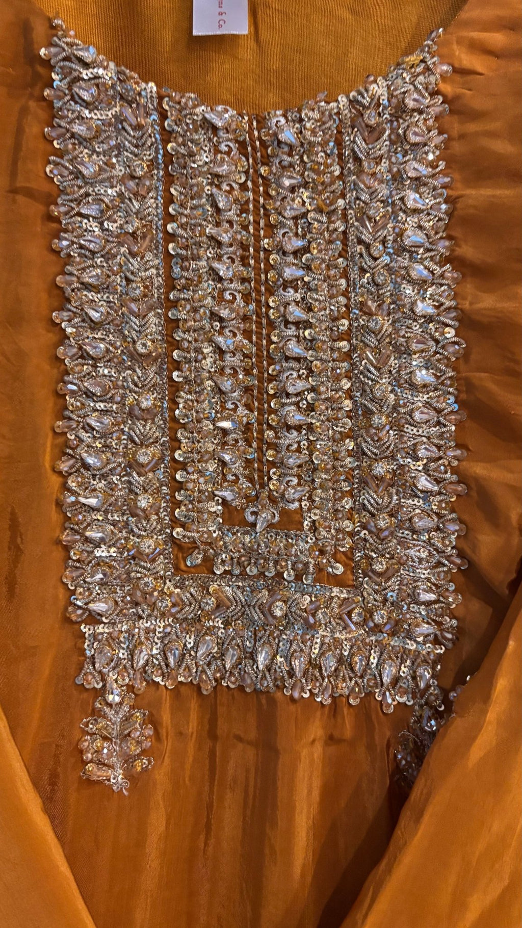 • Clothing: Embroidered/Printed suit for women - Made of best quality fabric - lawn or linen or chiffon - pure silk - Available at Najma Designs & Co. • Jewelry: Gold - plated stud earrings for