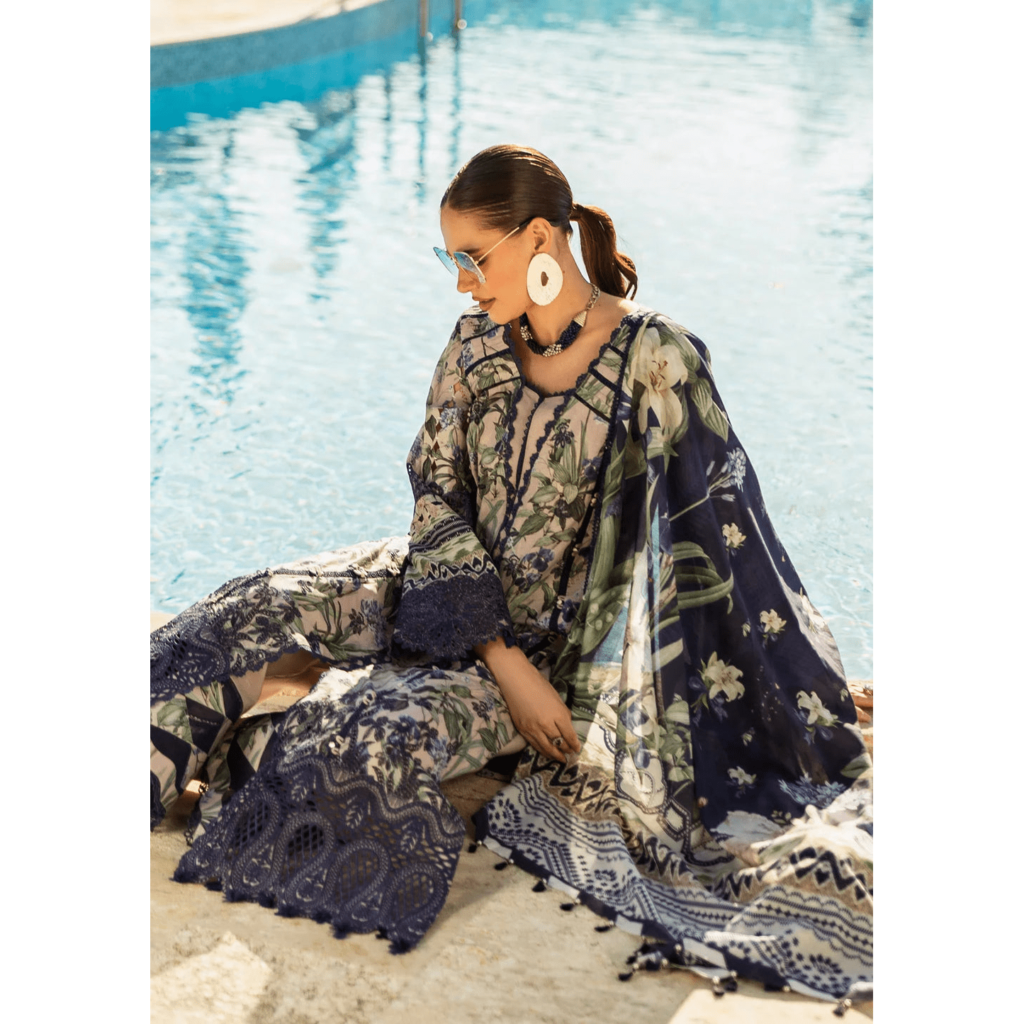 • Clothing: Embroidered/Printed suit for women - Made of best quality fabric - lawn or linen or chiffon - pure silk - Available at Najma Designs & Co. • Jewelry: Gold - plated stud earrings for