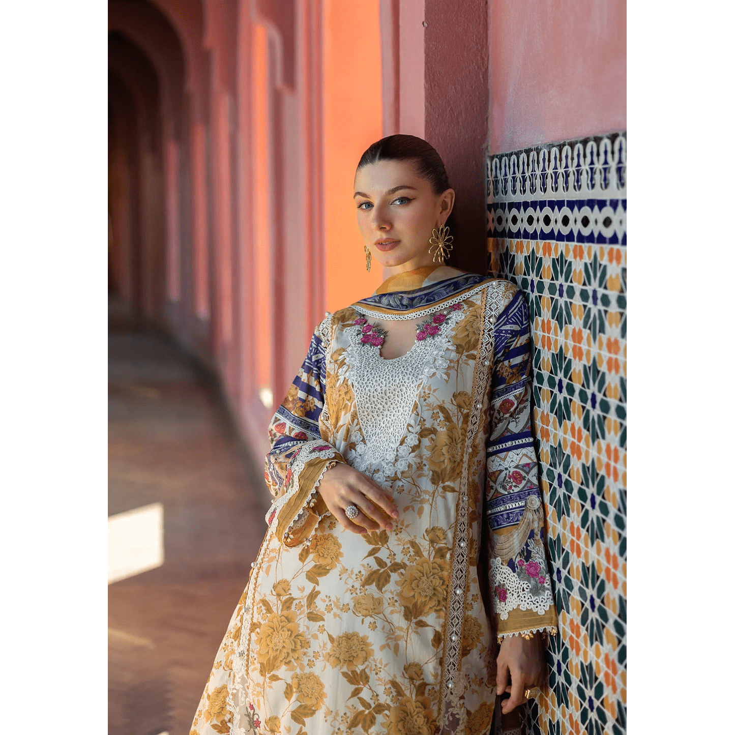 • Clothing: Embroidered/Printed suit for women - Made of best quality fabric - lawn or linen or chiffon - pure silk - Available at Najma Designs & Co. • Jewelry: Gold - plated stud earrings for