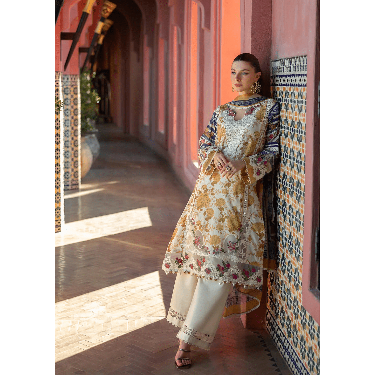 • Clothing: Embroidered/Printed suit for women - Made of best quality fabric - lawn or linen or chiffon - pure silk - Available at Najma Designs & Co. • Jewelry: Gold - plated stud earrings for