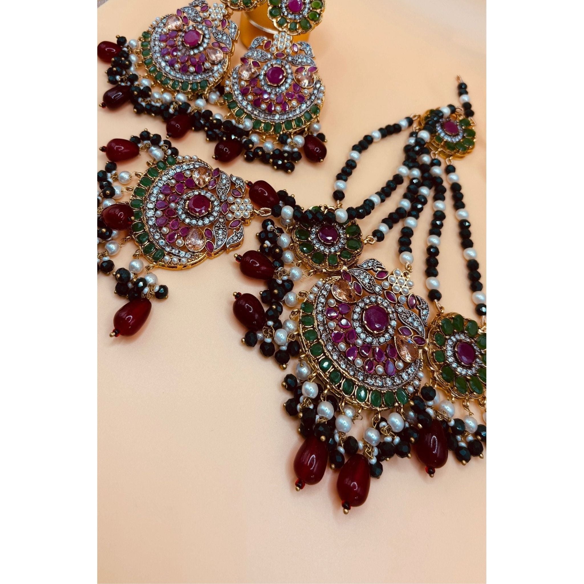 Emerald Bridal Jewelry Set with Tikka, Jhoomer Earrings, and Necklace, Embellished with Emerald, Ruby Stones, Pearl Motis, and Feroza Accents, Gold-Plated Brass, Perfect for Indian and Pakistani Brides, Adds Radiant Grace to Special Occasions, Ready to Ship"
