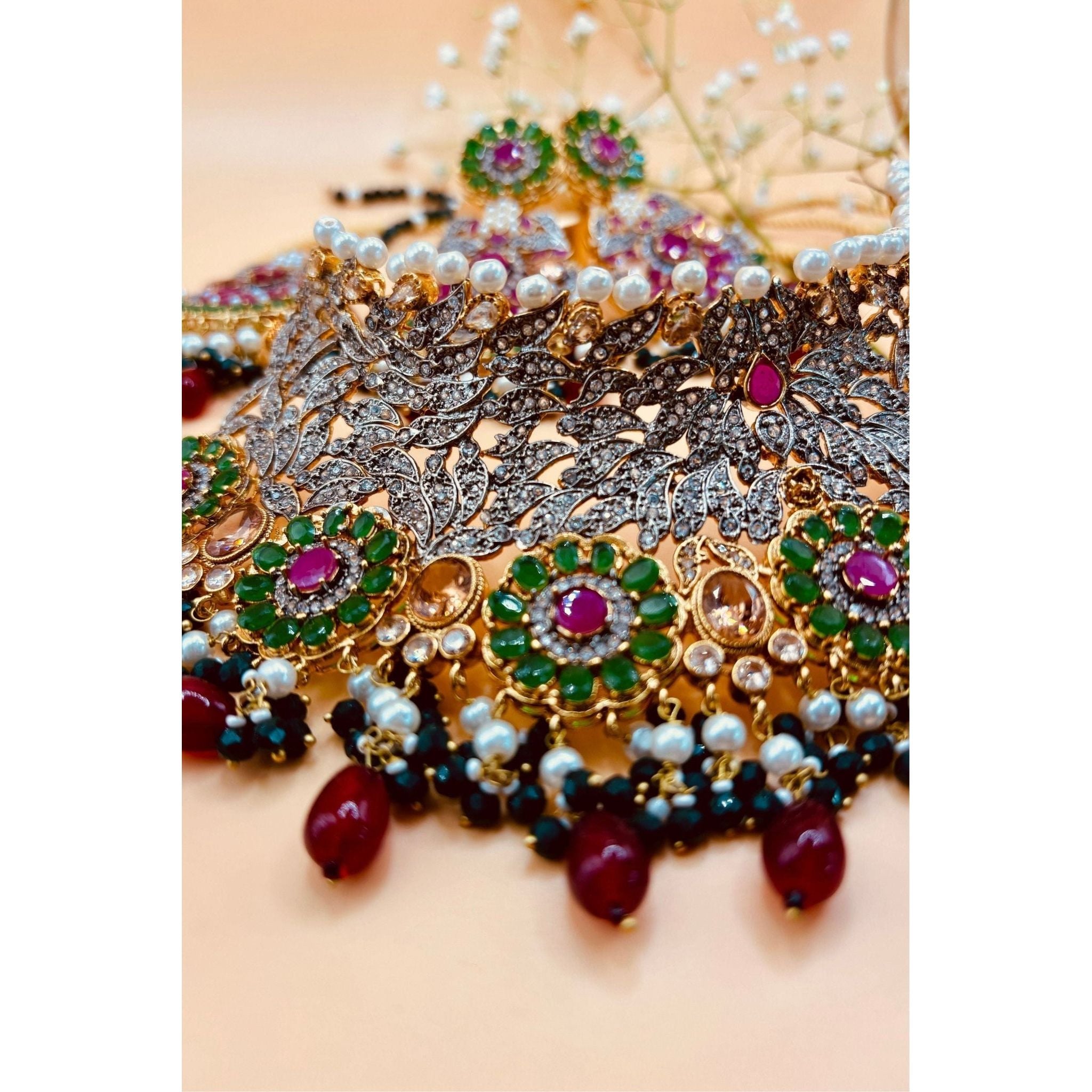 Emerald Bridal Jewelry Set with Tikka, Jhoomer Earrings, and Necklace, Embellished with Emerald, Ruby Stones, Pearl Motis, and Feroza Accents, Gold-Plated Brass, Perfect for Indian and Pakistani Brides, Adds Radiant Grace to Special Occasions, Ready to Ship"