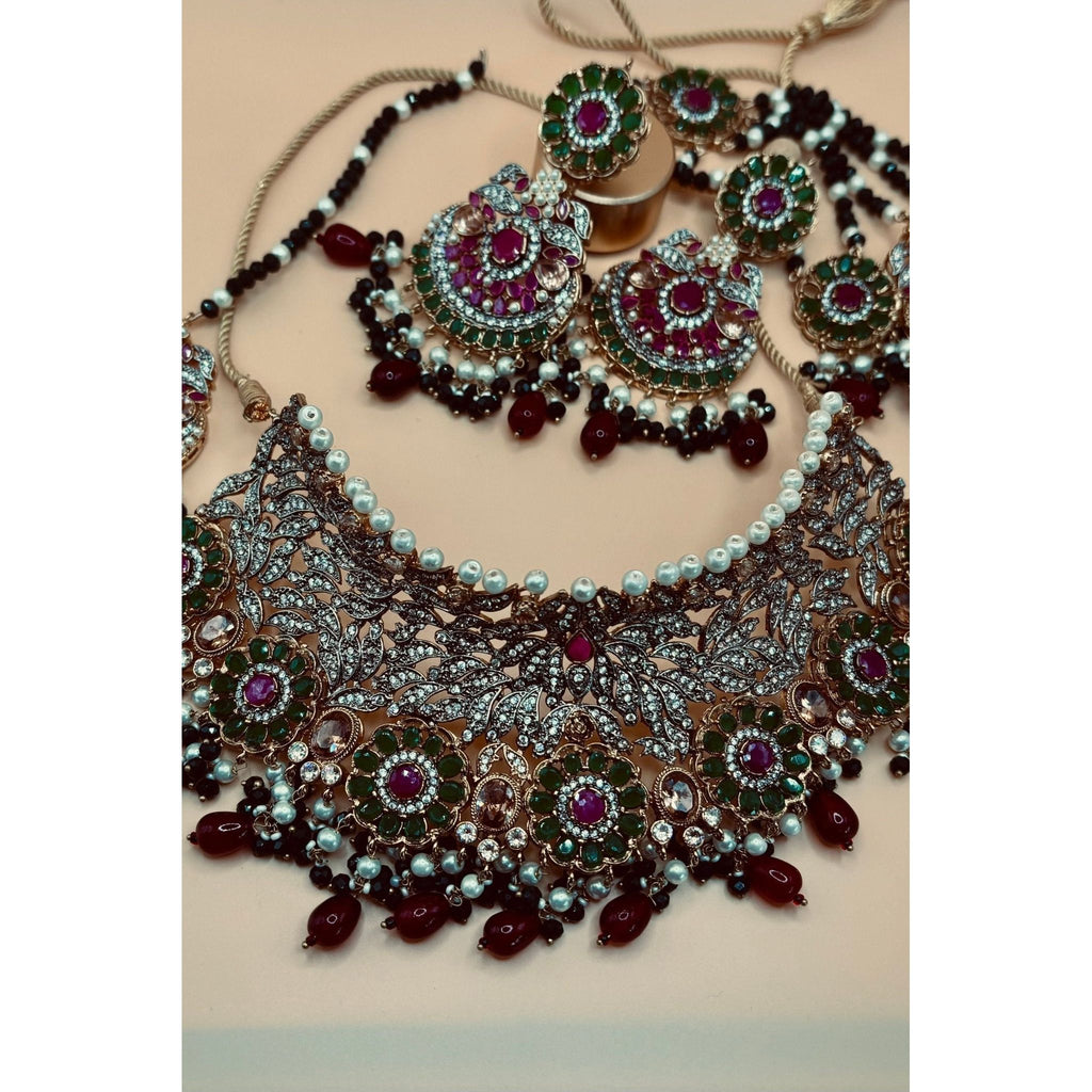 Emerald Bridal Jewelry Set with Tikka, Jhoomer Earrings, and Necklace, Embellished with Emerald, Ruby Stones, Pearl Motis, and Feroza Accents, Gold-Plated Brass, Perfect for Indian and Pakistani Brides, Adds Radiant Grace to Special Occasions, Ready to Ship"