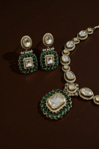 • Clothing: Embroidered/Printed suit for women - Made of best quality fabric - lawn or linen or chiffon - pure silk - Available at Najma Designs & Co. • Jewelry: Gold - plated stud earrings for