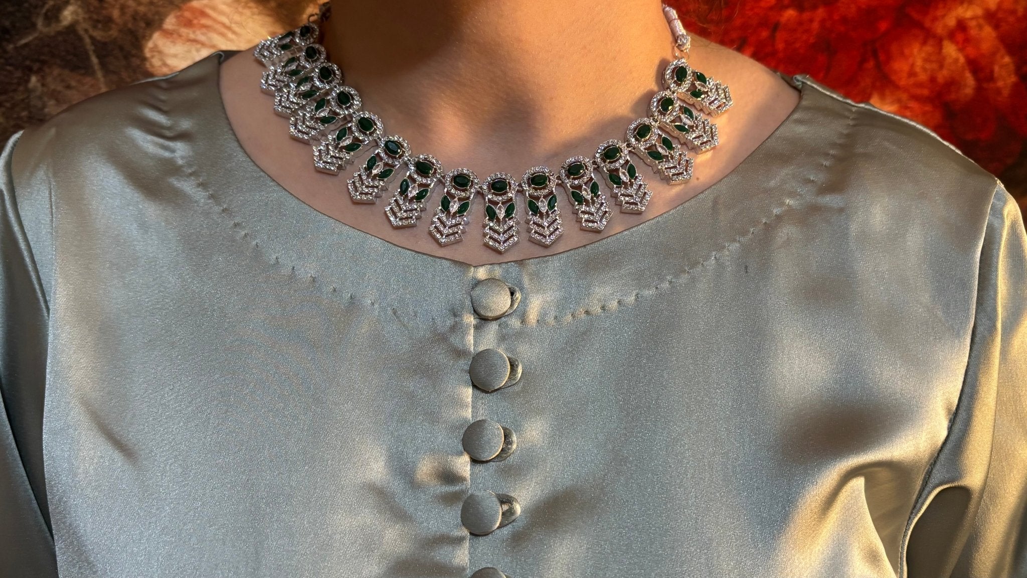 • Clothing: Embroidered/Printed suit for women - Made of best quality fabric - lawn or linen or chiffon - pure silk - Available at Najma Designs & Co. • Jewelry: Gold - plated stud earrings for