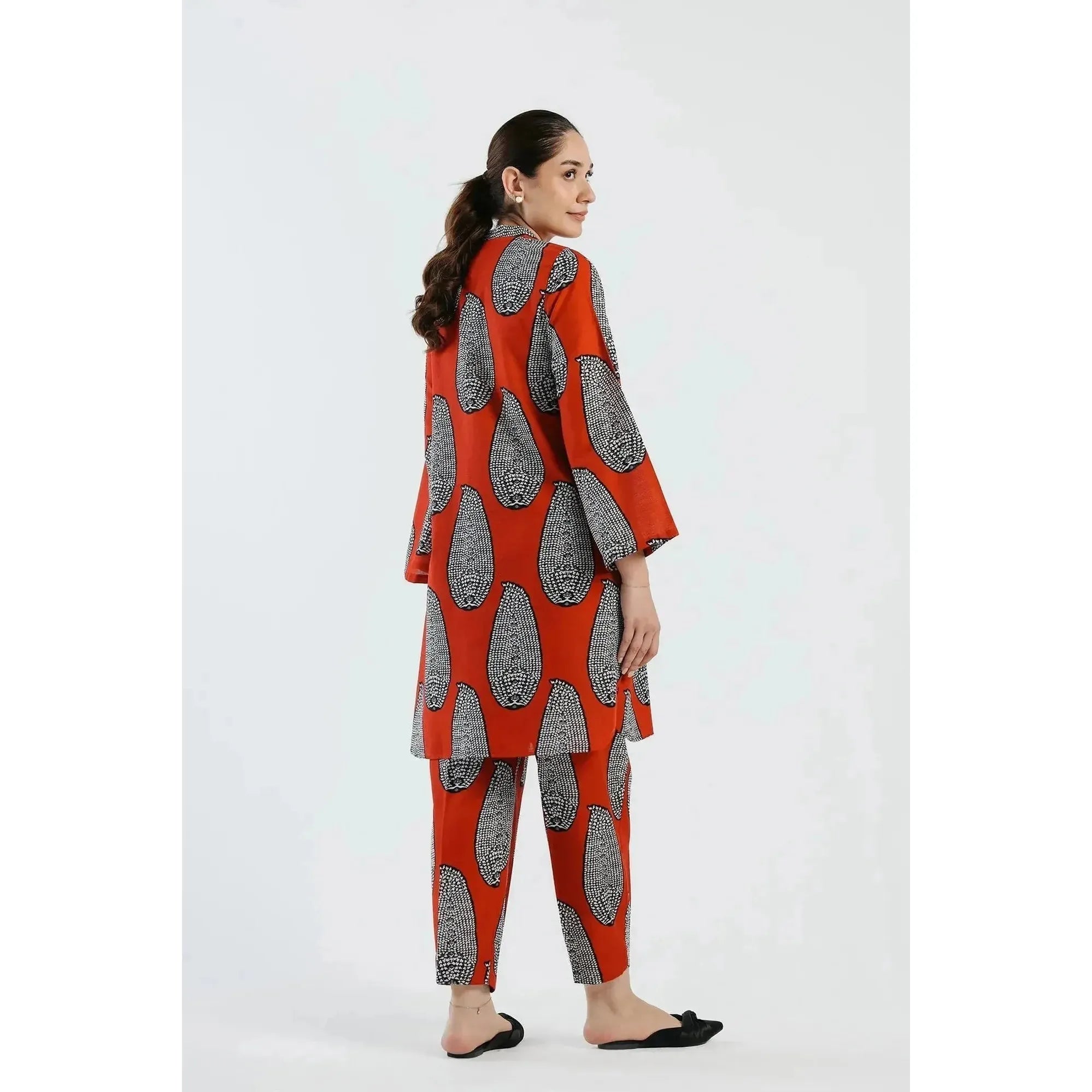ETHC Red Two-Piece Artistic Ensemble with Monochromatic Print, Slub Khaddar Fabric, Trendy Ban V Collar, Slouchy Fit Trouser, Chic and Sophisticated Design, Stitched and Ready to Wear