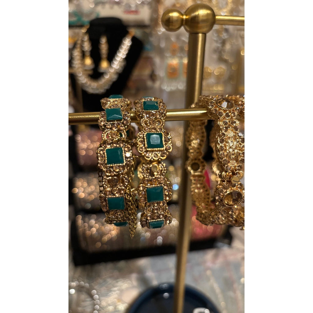 • Clothing: Embroidered/Printed suit for women - Made of best quality fabric - lawn or linen or chiffon - pure silk - Available at Najma Designs & Co. • Jewelry: Gold - plated stud earrings for
