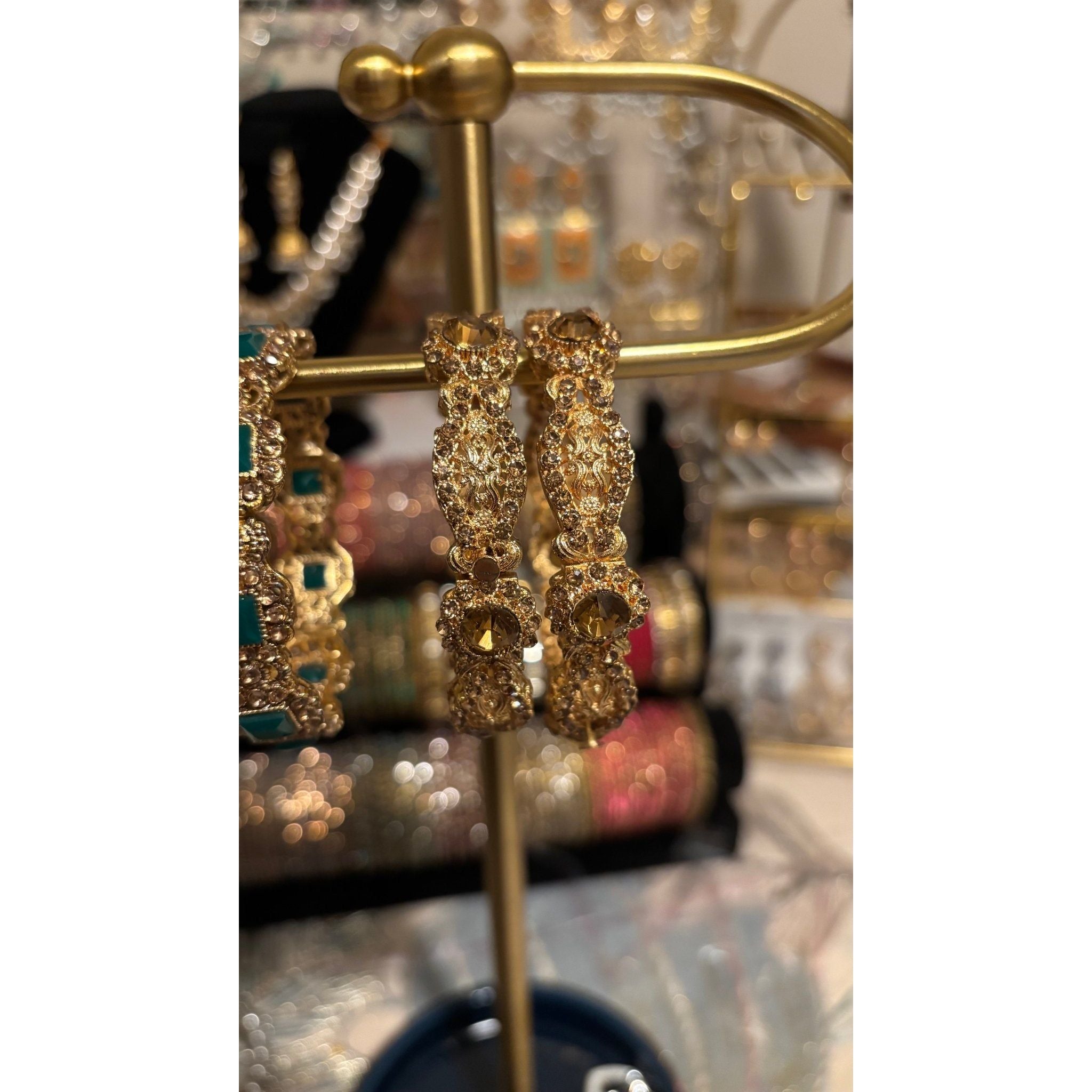 • Clothing: Embroidered/Printed suit for women - Made of best quality fabric - lawn or linen or chiffon - pure silk - Available at Najma Designs & Co. • Jewelry: Gold - plated stud earrings for