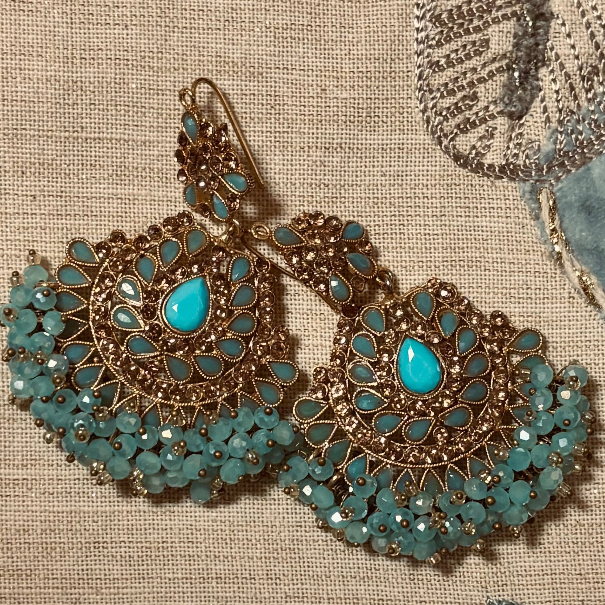 • Clothing: Embroidered/Printed suit for women - Made of best quality fabric - lawn or linen or chiffon - pure silk - Available at Najma Designs & Co. • Jewelry: Gold - plated stud earrings for