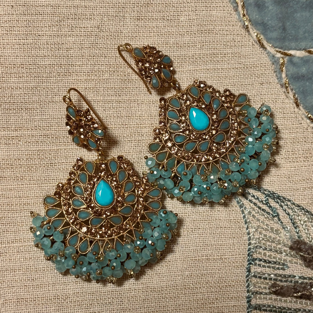 • Clothing: Embroidered/Printed suit for women - Made of best quality fabric - lawn or linen or chiffon - pure silk - Available at Najma Designs & Co. • Jewelry: Gold - plated stud earrings for