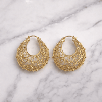 • Clothing: Embroidered/Printed suit for women - Made of best quality fabric - lawn or linen or chiffon- pure silk - Available at Najma Designs & Co. • Jewelry: Gold-plated stud earrings for