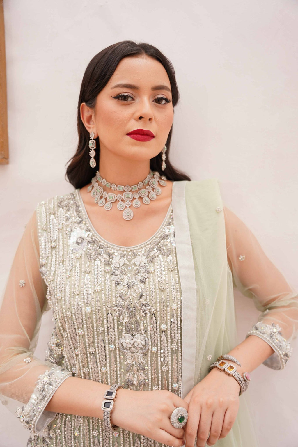 • Clothing: Embroidered/Printed suit for women - Made of best quality fabric - lawn or linen or chiffon - pure silk - Available at Najma Designs & Co. • Jewelry: Gold - plated stud earrings for