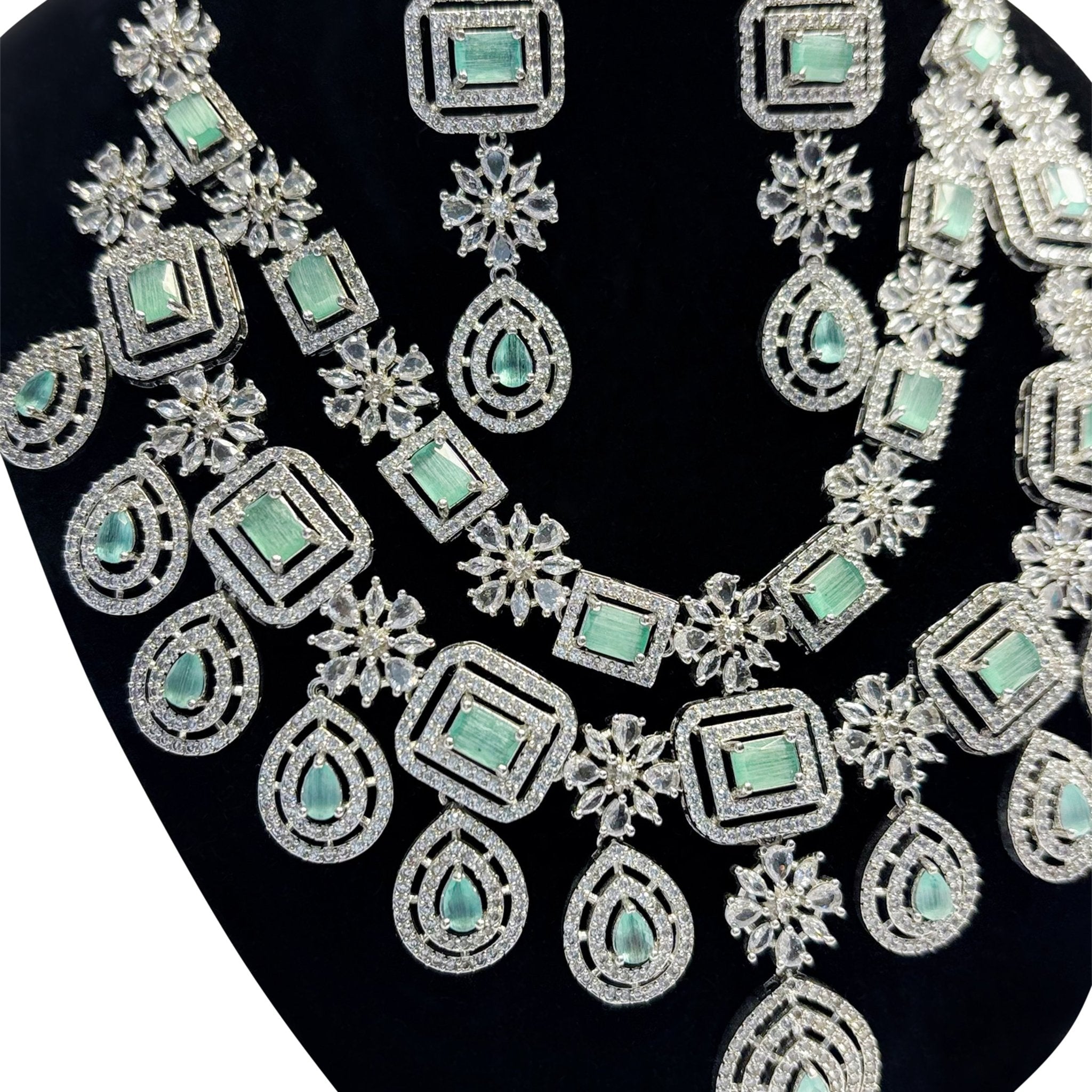 • Clothing: Embroidered/Printed suit for women - Made of best quality fabric - lawn or linen or chiffon - pure silk - Available at Najma Designs & Co. • Jewelry: Gold - plated stud earrings for