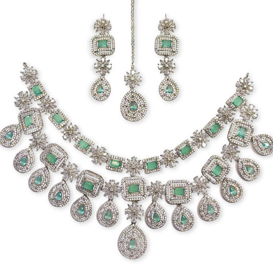 • Clothing: Embroidered/Printed suit for women - Made of best quality fabric - lawn or linen or chiffon - pure silk - Available at Najma Designs & Co. • Jewelry: Gold - plated stud earrings for