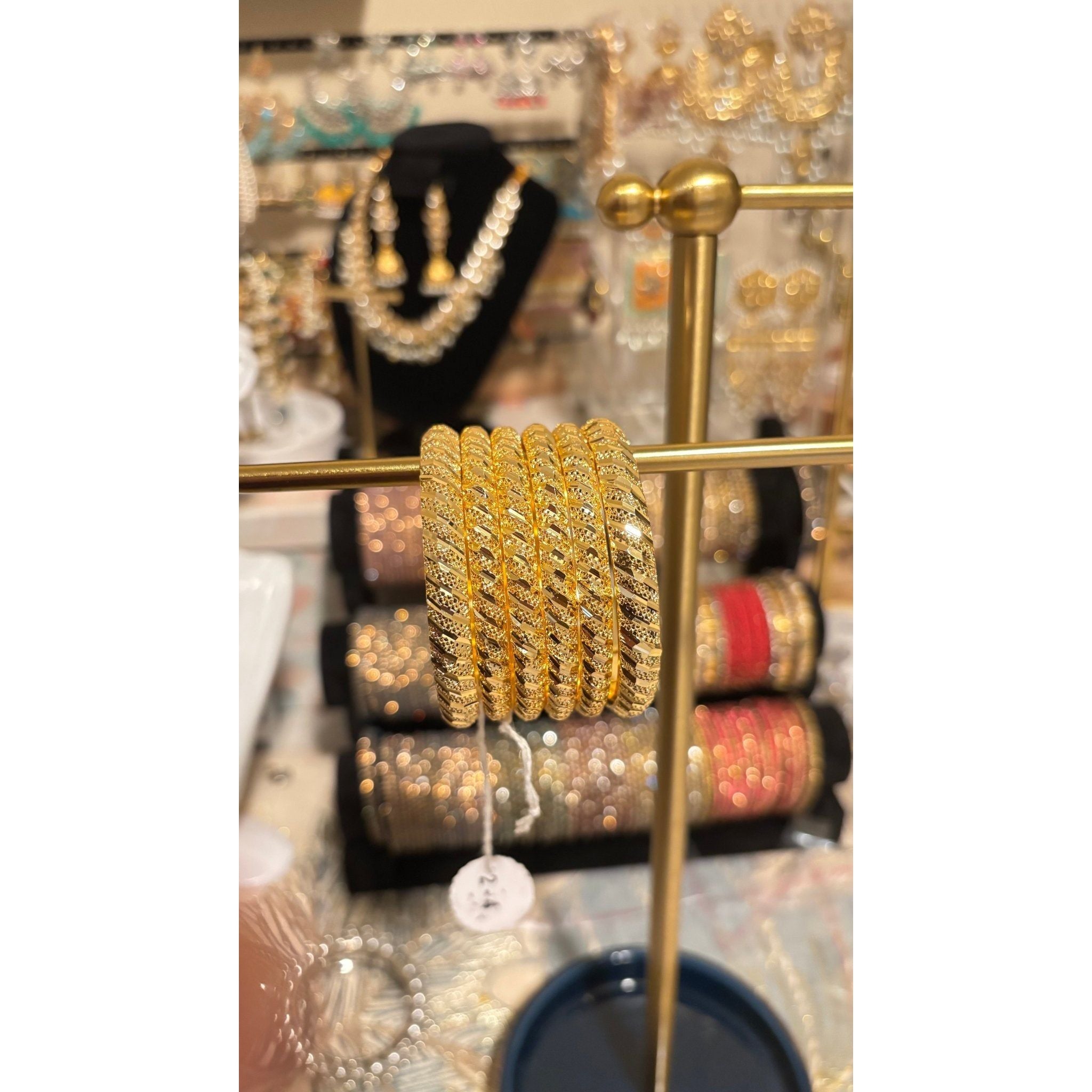 • Clothing: Embroidered/Printed suit for women - Made of best quality fabric - lawn or linen or chiffon - pure silk - Available at Najma Designs & Co. • Jewelry: Gold - plated stud earrings for