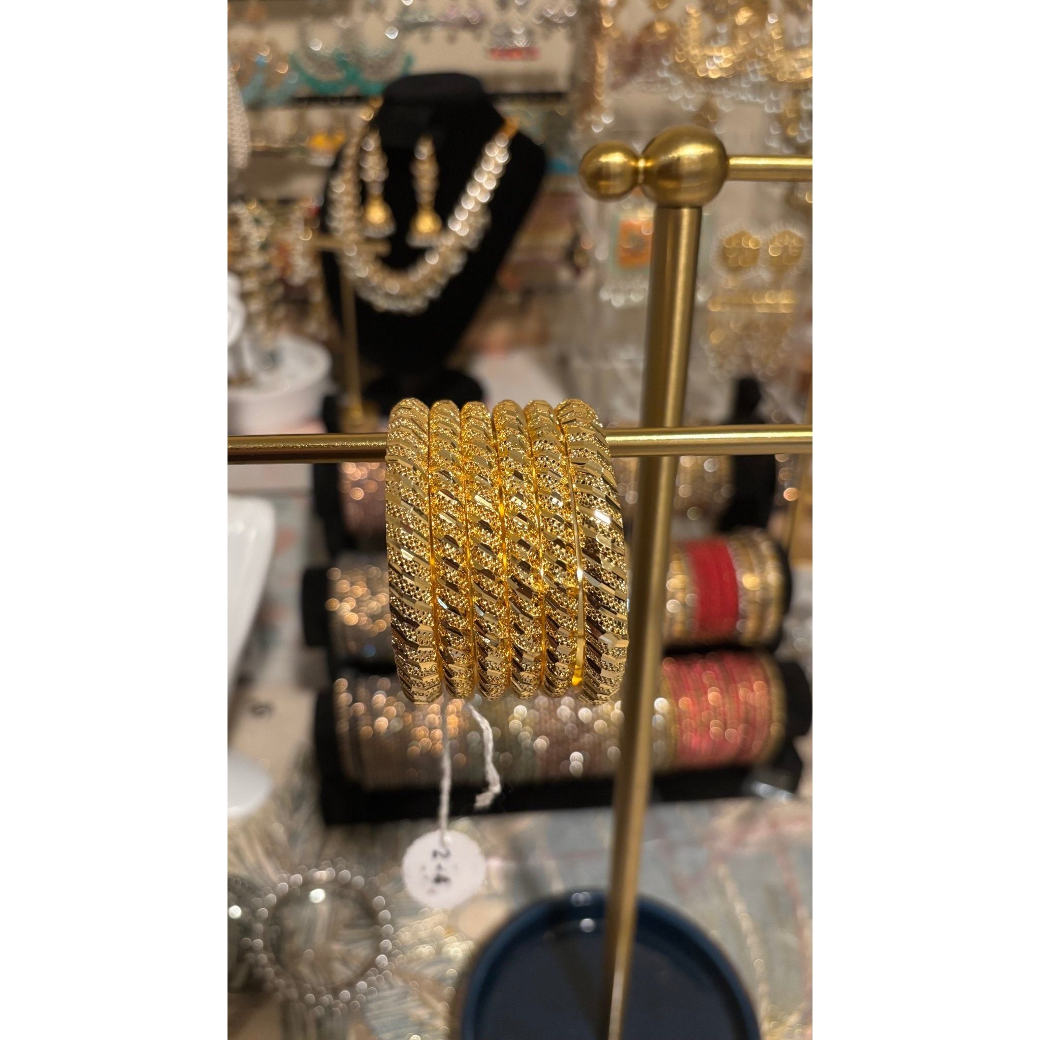 • Clothing: Embroidered/Printed suit for women - Made of best quality fabric - lawn or linen or chiffon - pure silk - Available at Najma Designs & Co. • Jewelry: Gold - plated stud earrings for