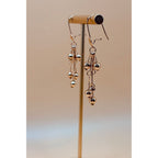 These golden dangling earrings are made with the best quality 1-carat gold plated, ensuring both beauty and durability.