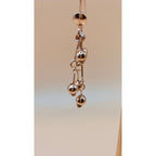 These golden dangling earrings are made with the best quality 1-carat gold plated, ensuring both beauty and durability.