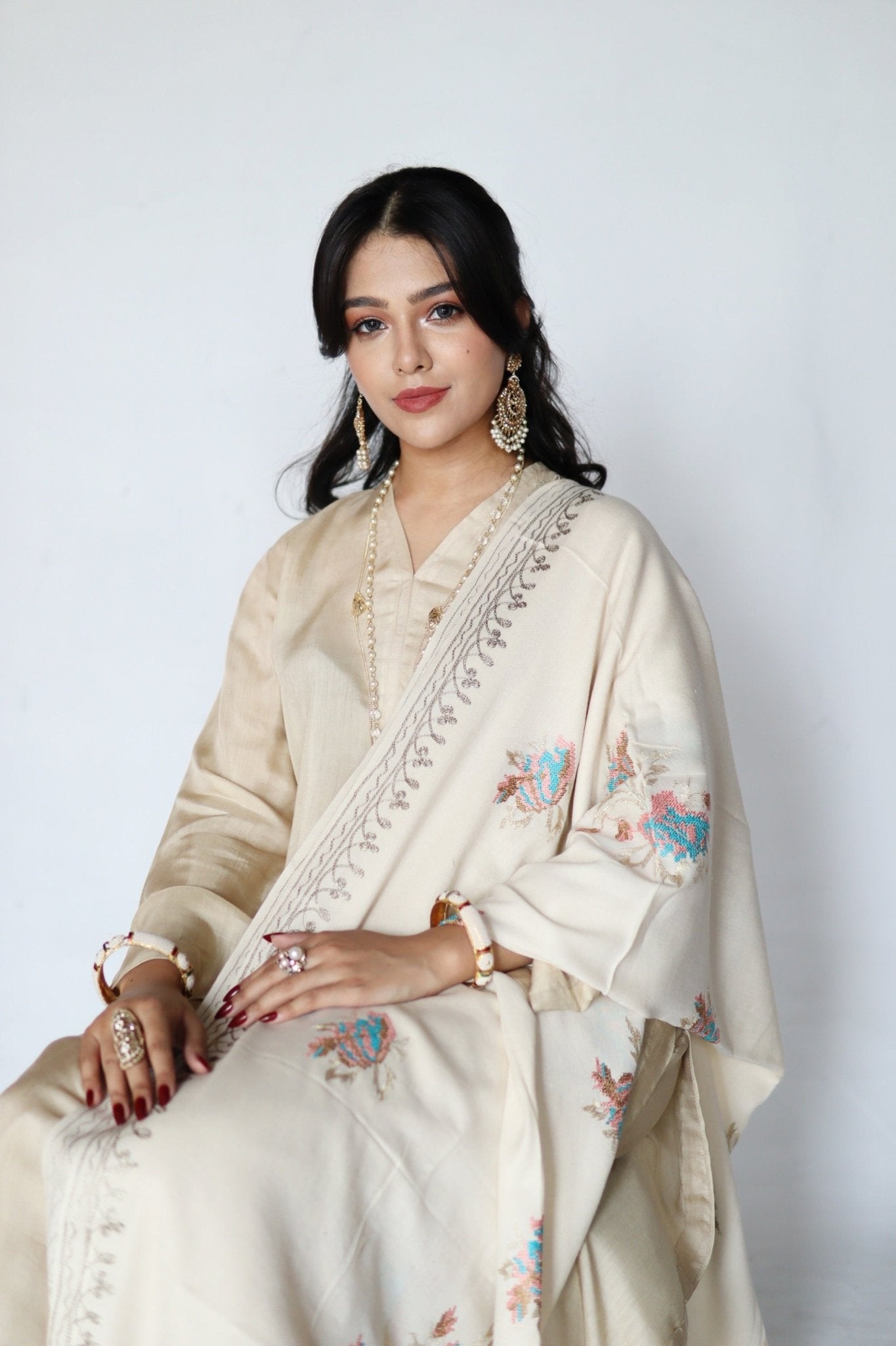 • Clothing: Embroidered/Printed suit for women - Made of best quality fabric - lawn or linen or chiffon - pure silk - Available at Najma Designs & Co. • Jewelry: Gold - plated stud earrings for