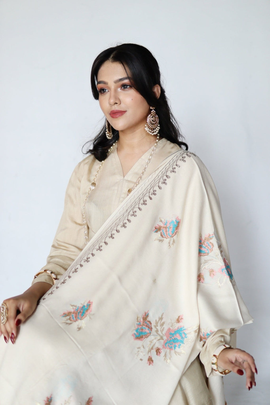 • Clothing: Embroidered/Printed suit for women - Made of best quality fabric - lawn or linen or chiffon - pure silk - Available at Najma Designs & Co. • Jewelry: Gold - plated stud earrings for