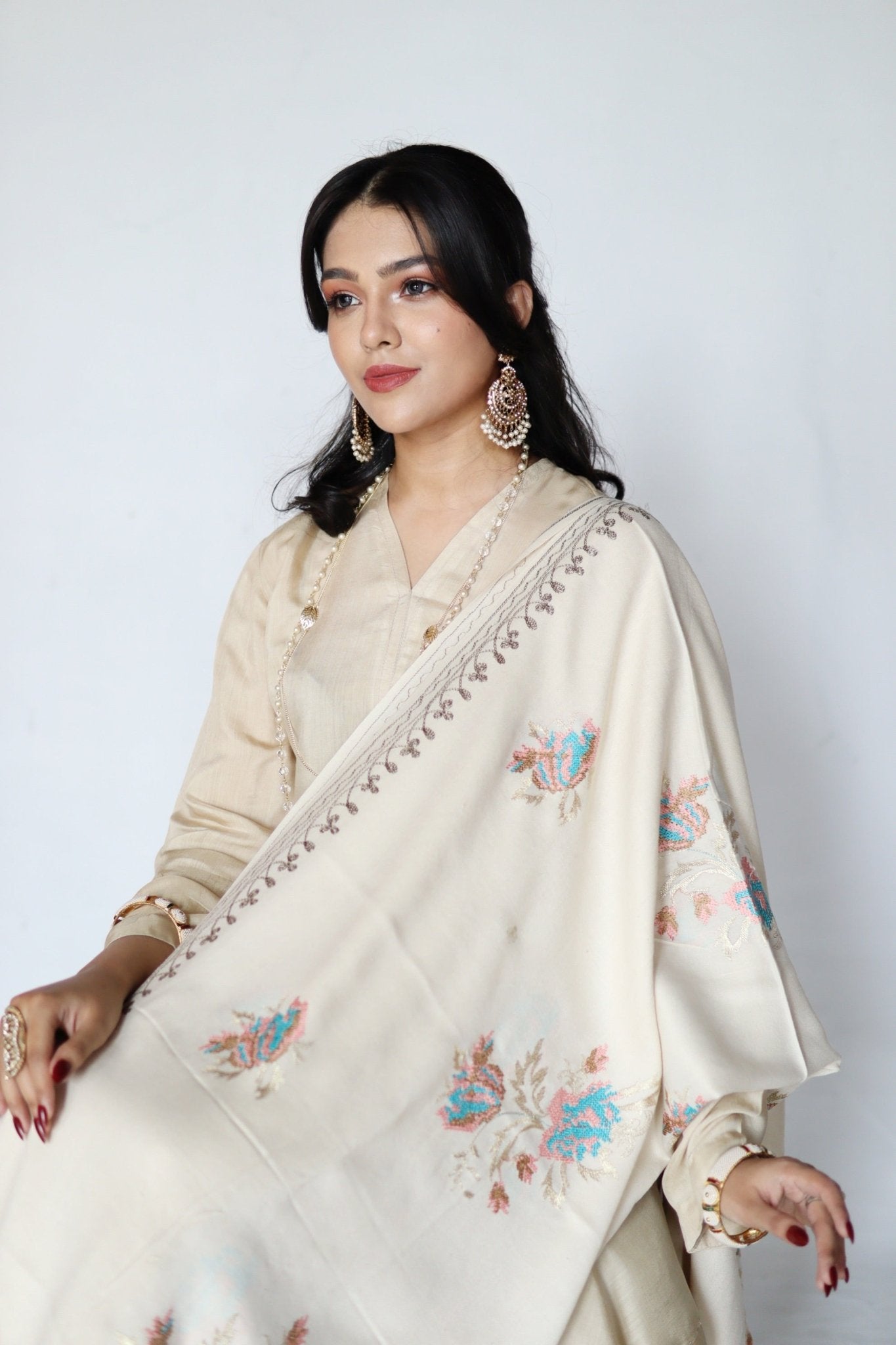 • Clothing: Embroidered/Printed suit for women - Made of best quality fabric - lawn or linen or chiffon - pure silk - Available at Najma Designs & Co. • Jewelry: Gold - plated stud earrings for