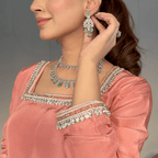 • Clothing: Embroidered/Printed suit for women - Made of best quality fabric - lawn or linen or chiffon - pure silk - Available at Najma Designs & Co. • Jewelry: Gold - plated stud earrings for