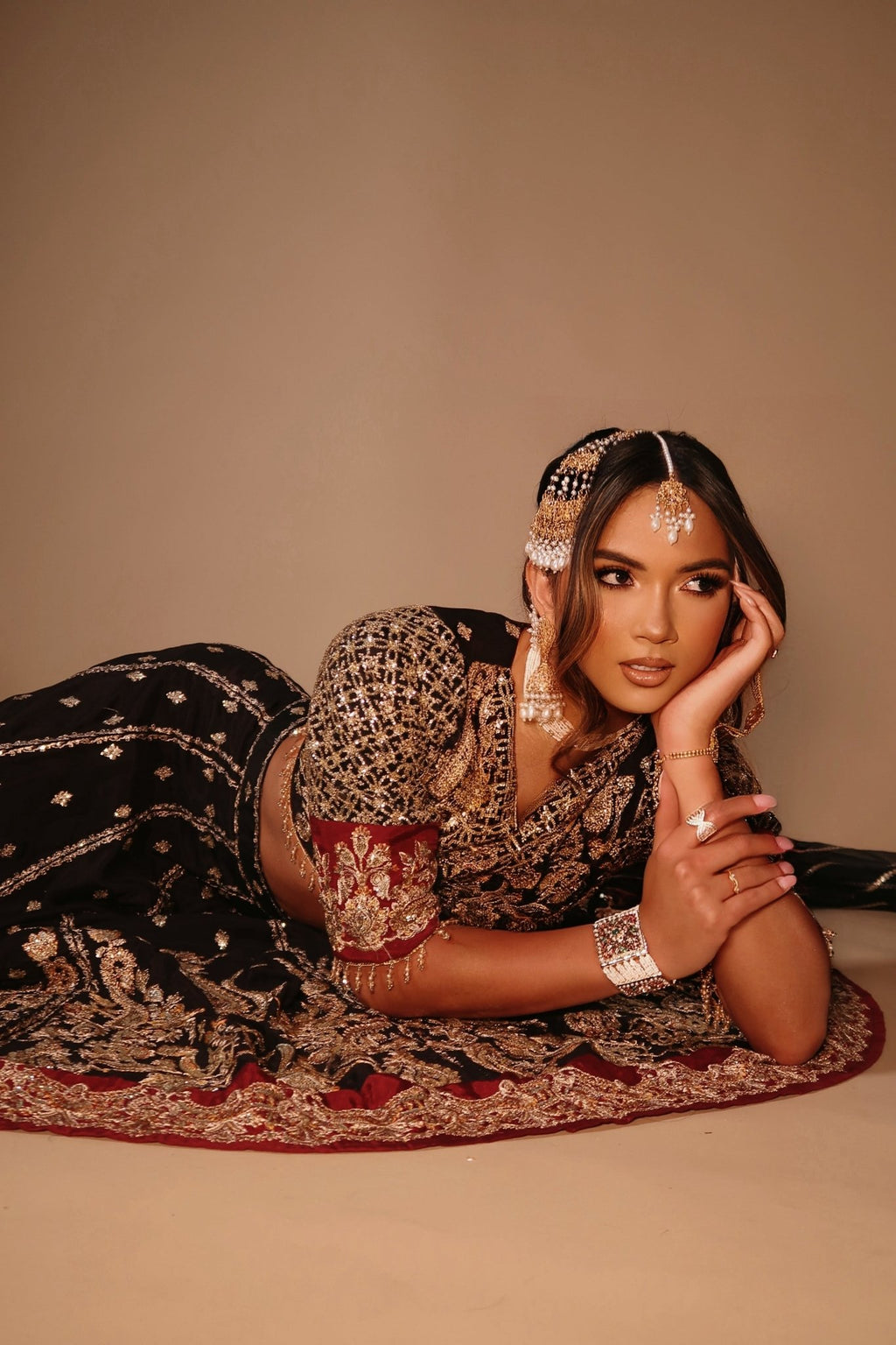 • Clothing: Embroidered/Printed suit for women - Made of best quality fabric - lawn or linen or chiffon- pure silk - Available at Najma Designs & Co. • Jewelry: Gold-plated stud earrings for