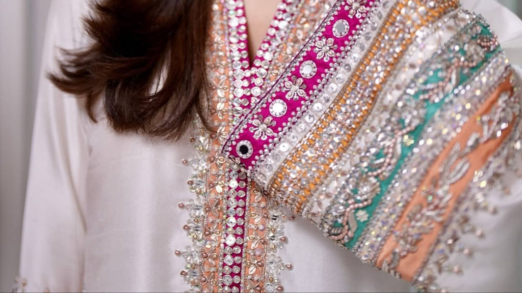 • Clothing: Embroidered/Printed suit for women - Made of best quality fabric - lawn or linen or chiffon - pure silk - Available at Najma Designs & Co. • Jewelry: Gold - plated stud earrings for