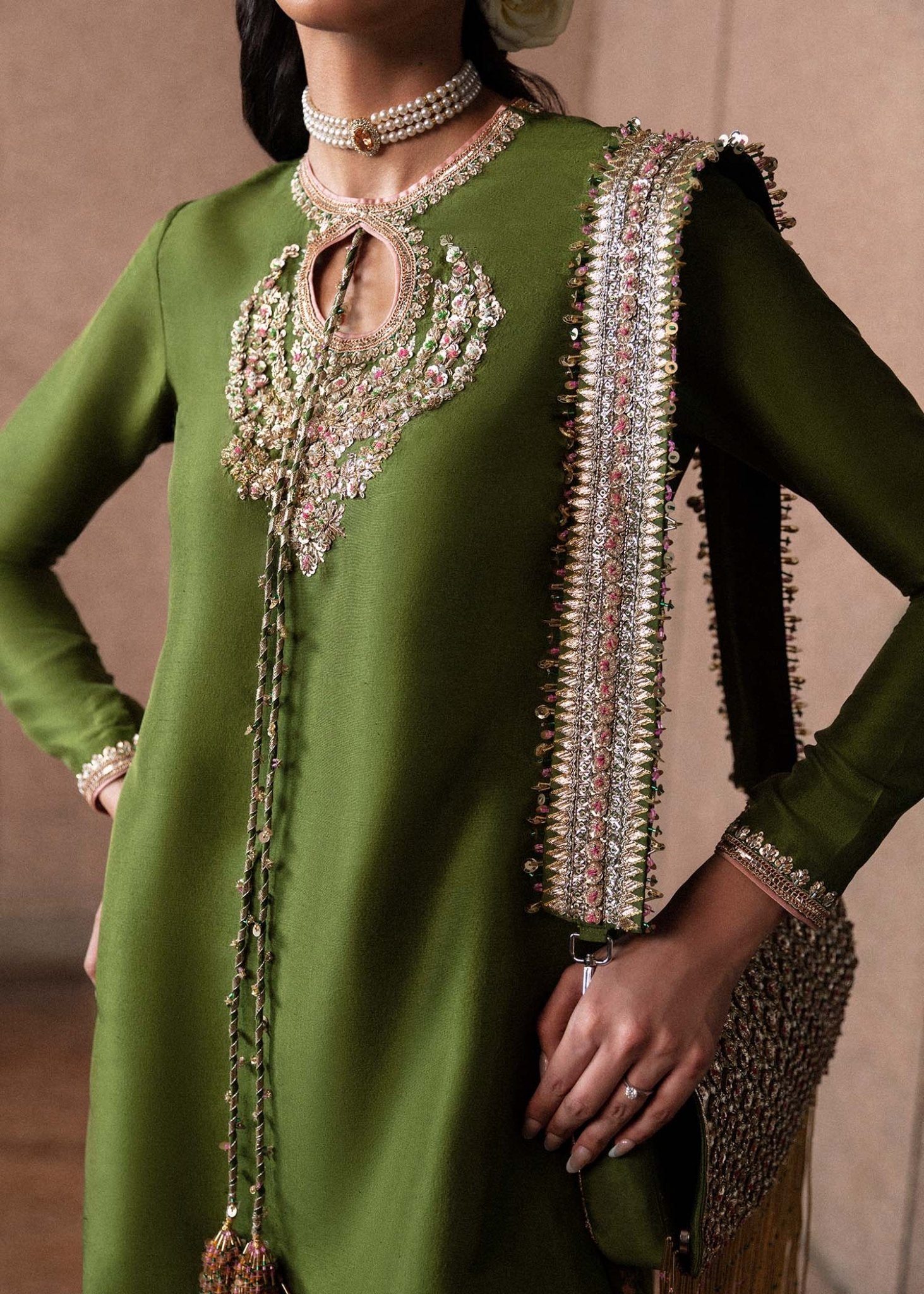 • Clothing: Embroidered/Printed suit for women - Made of best quality fabric - lawn or linen or chiffon - pure silk - Available at Najma Designs & Co. • Jewelry: Gold - plated stud earrings for
