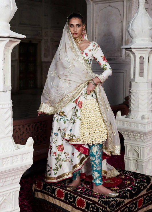 • Clothing: Embroidered/Printed suit for women - Made of best quality fabric - lawn or linen or chiffon - pure silk - Available at Najma Designs & Co. • Jewelry: Gold - plated stud earrings for