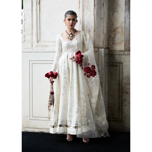 • Clothing: Embroidered/Printed suit for women - Made of best quality fabric - lawn or linen or chiffon - pure silk - Available at Najma Designs & Co. • Jewelry: Gold - plated stud earrings for