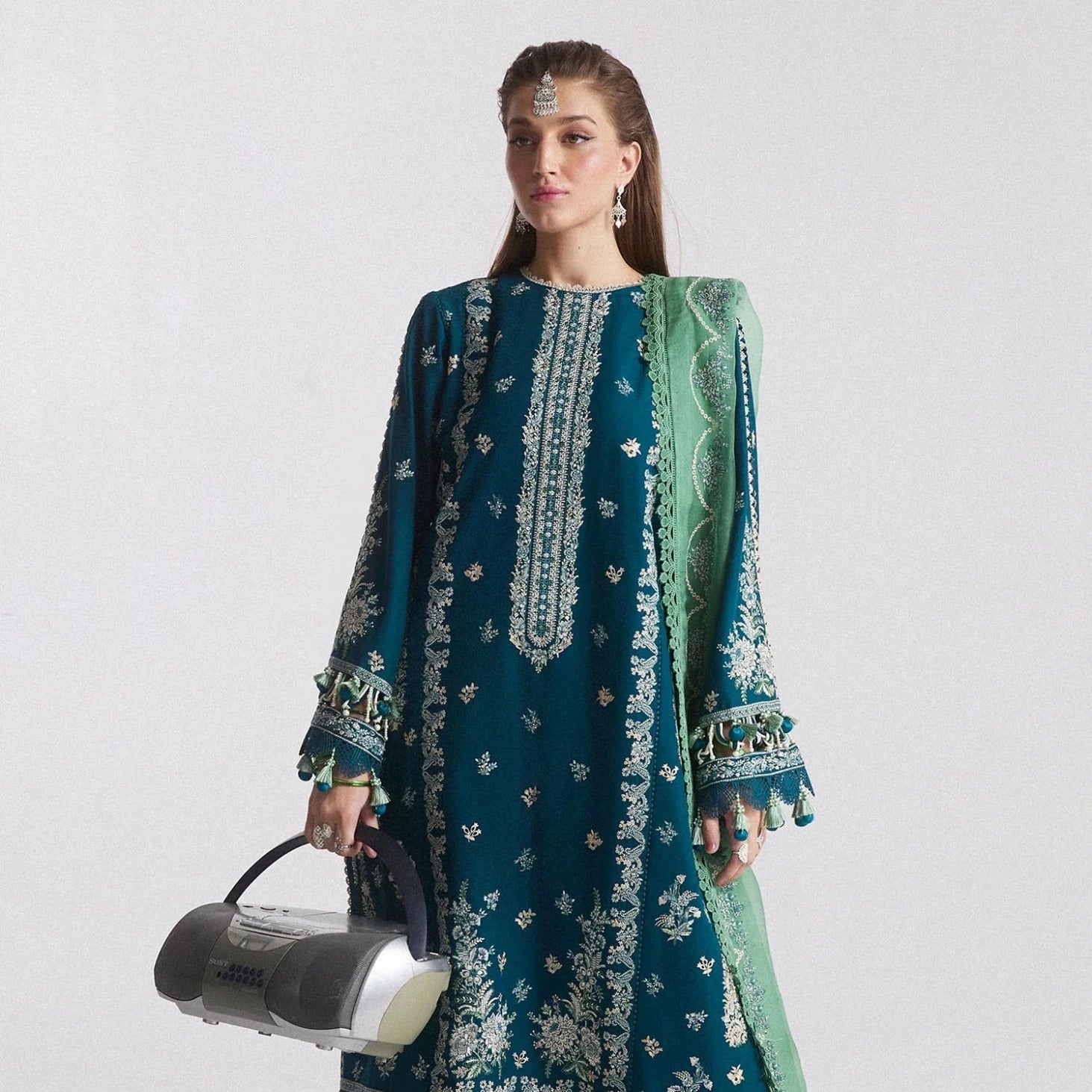 • Clothing: Embroidered/Printed suit for women - Made of best quality fabric - lawn or linen or chiffon - pure silk - Available at Najma Designs & Co. • Jewelry: Gold - plated stud earrings for