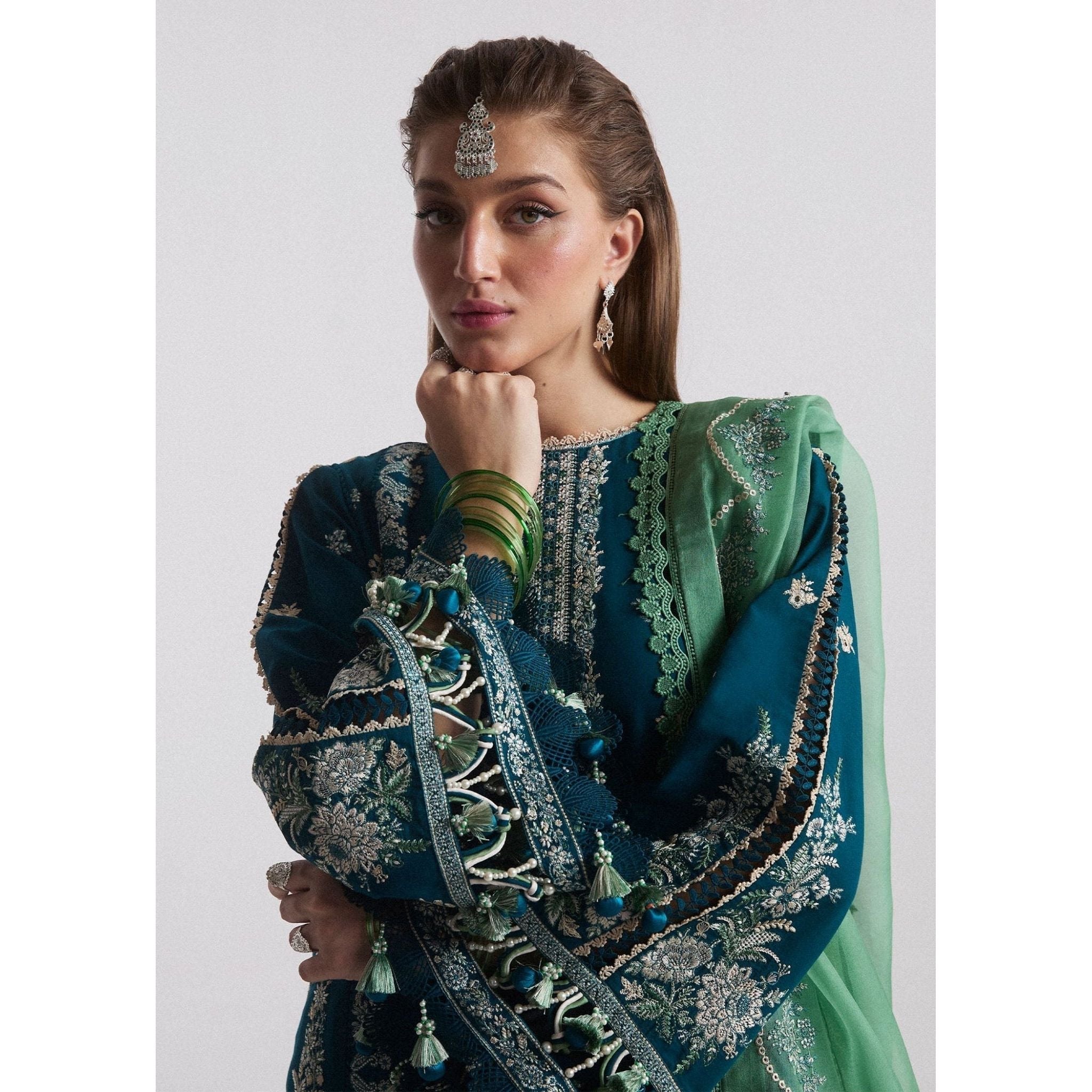 • Clothing: Embroidered/Printed suit for women - Made of best quality fabric - lawn or linen or chiffon - pure silk - Available at Najma Designs & Co. • Jewelry: Gold - plated stud earrings for