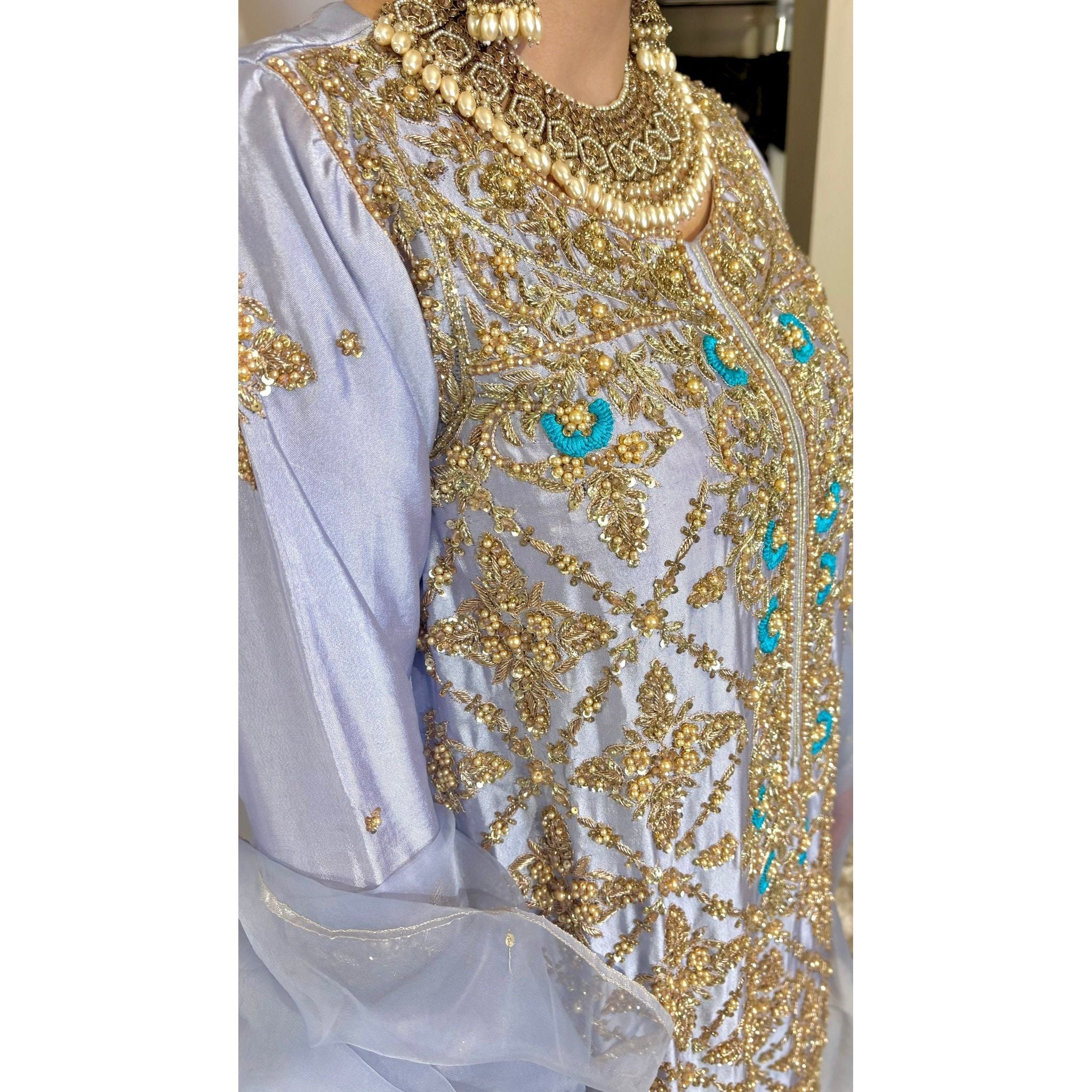 • Clothing: Embroidered/Printed suit for women - Made of best quality fabric - lawn or linen or chiffon - pure silk - Available at Najma Designs & Co. • Jewelry: Gold - plated stud earrings for