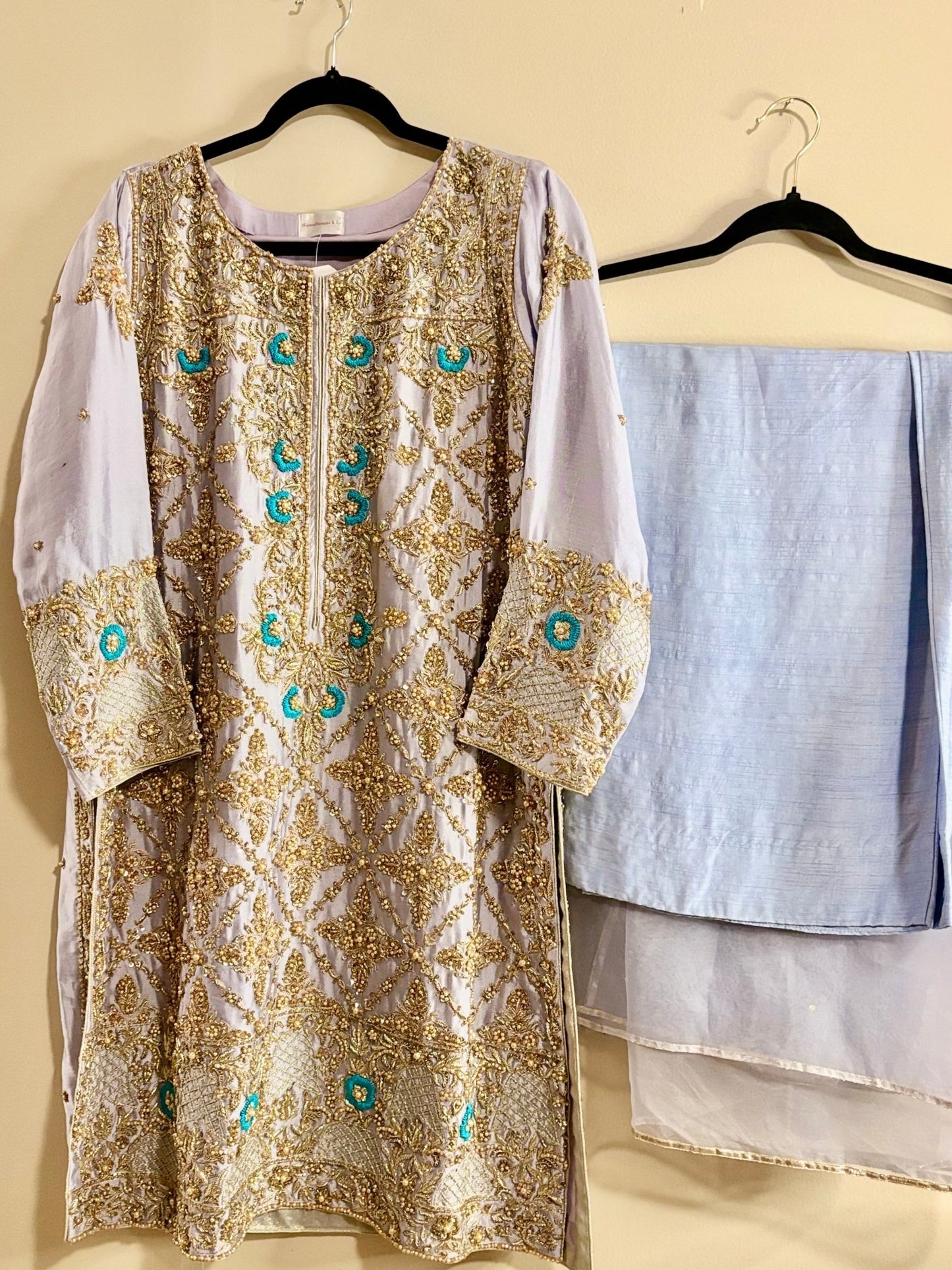 • Clothing: Embroidered/Printed suit for women - Made of best quality fabric - lawn or linen or chiffon - pure silk - Available at Najma Designs & Co. • Jewelry: Gold - plated stud earrings for