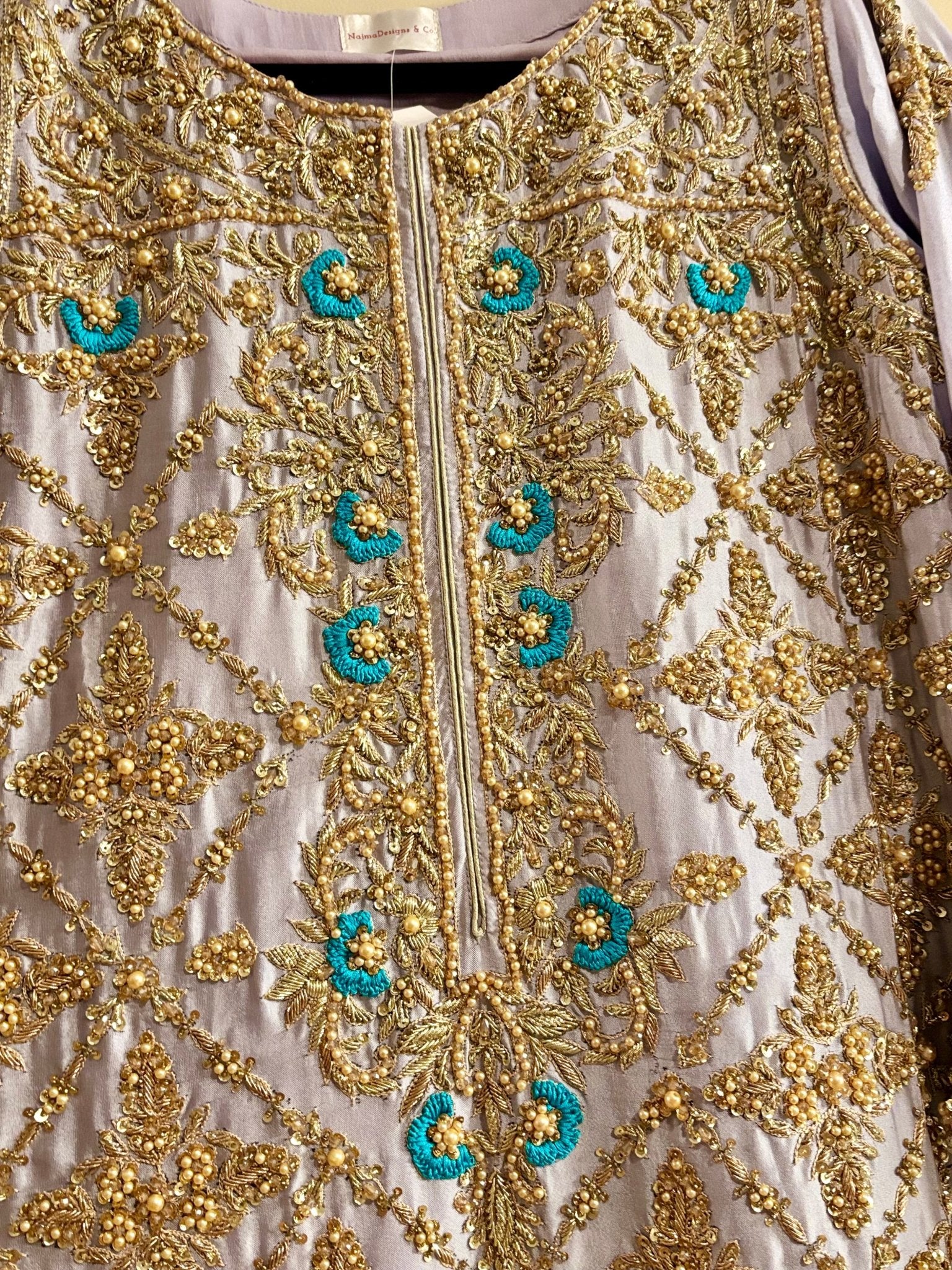 • Clothing: Embroidered/Printed suit for women - Made of best quality fabric - lawn or linen or chiffon - pure silk - Available at Najma Designs & Co. • Jewelry: Gold - plated stud earrings for