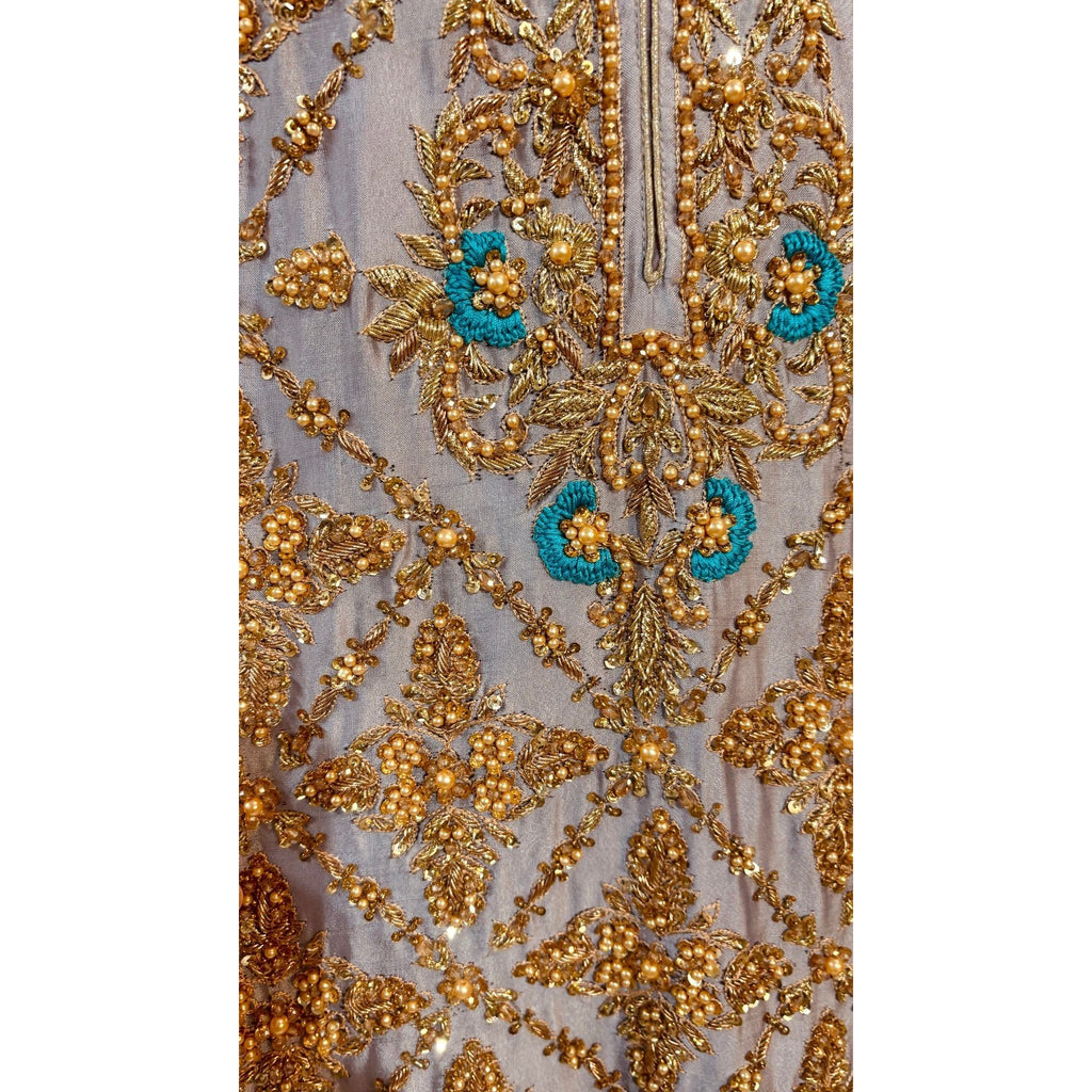 • Clothing: Embroidered/Printed suit for women - Made of best quality fabric - lawn or linen or chiffon - pure silk - Available at Najma Designs & Co. • Jewelry: Gold - plated stud earrings for