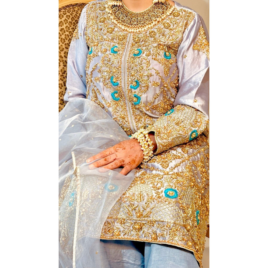 • Clothing: Embroidered/Printed suit for women - Made of best quality fabric - lawn or linen or chiffon - pure silk - Available at Najma Designs & Co. • Jewelry: Gold - plated stud earrings for